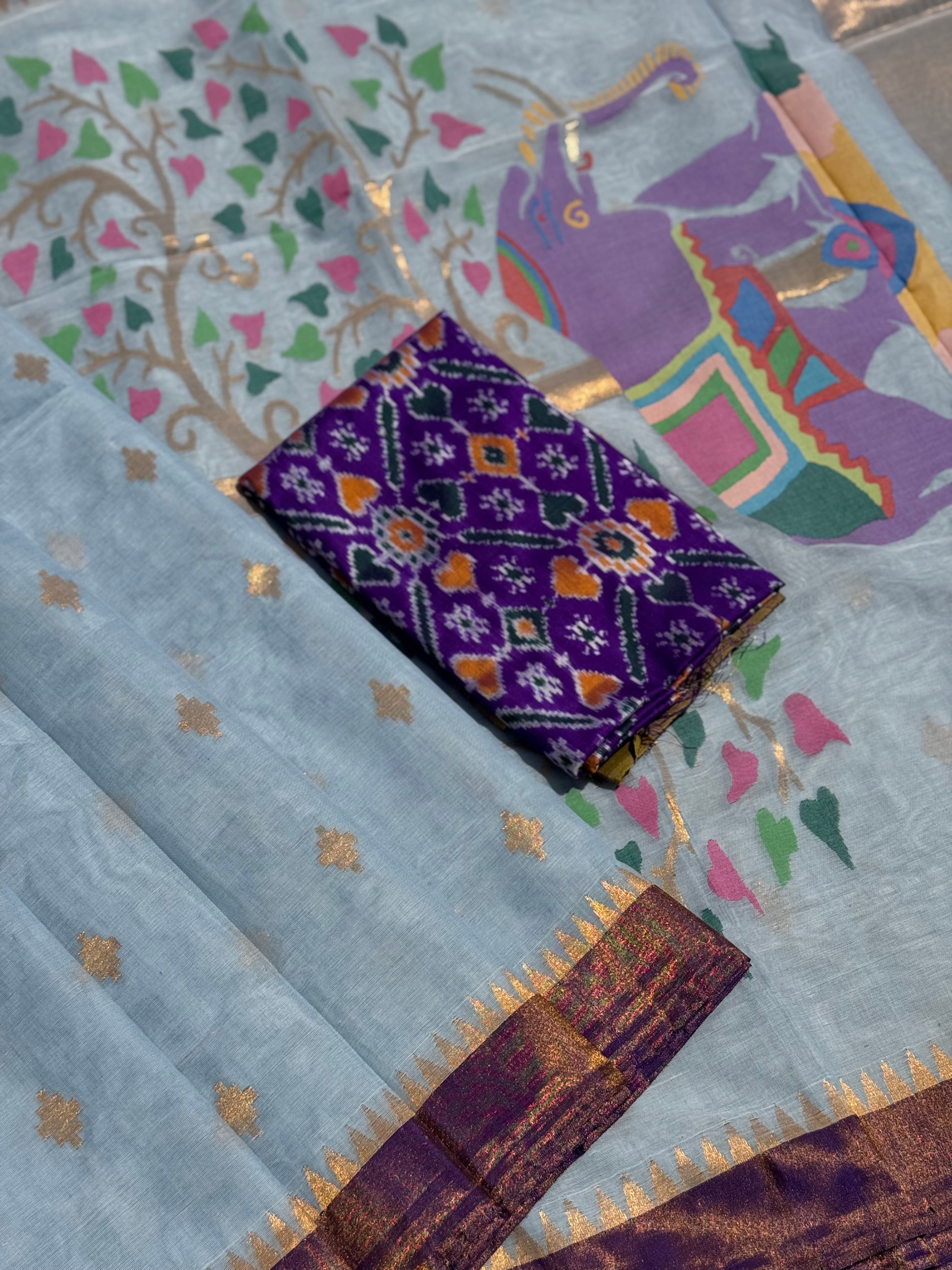 A gorgeous pastel powder blue shade handspun ponduru Khadhi jamdani cotton saree