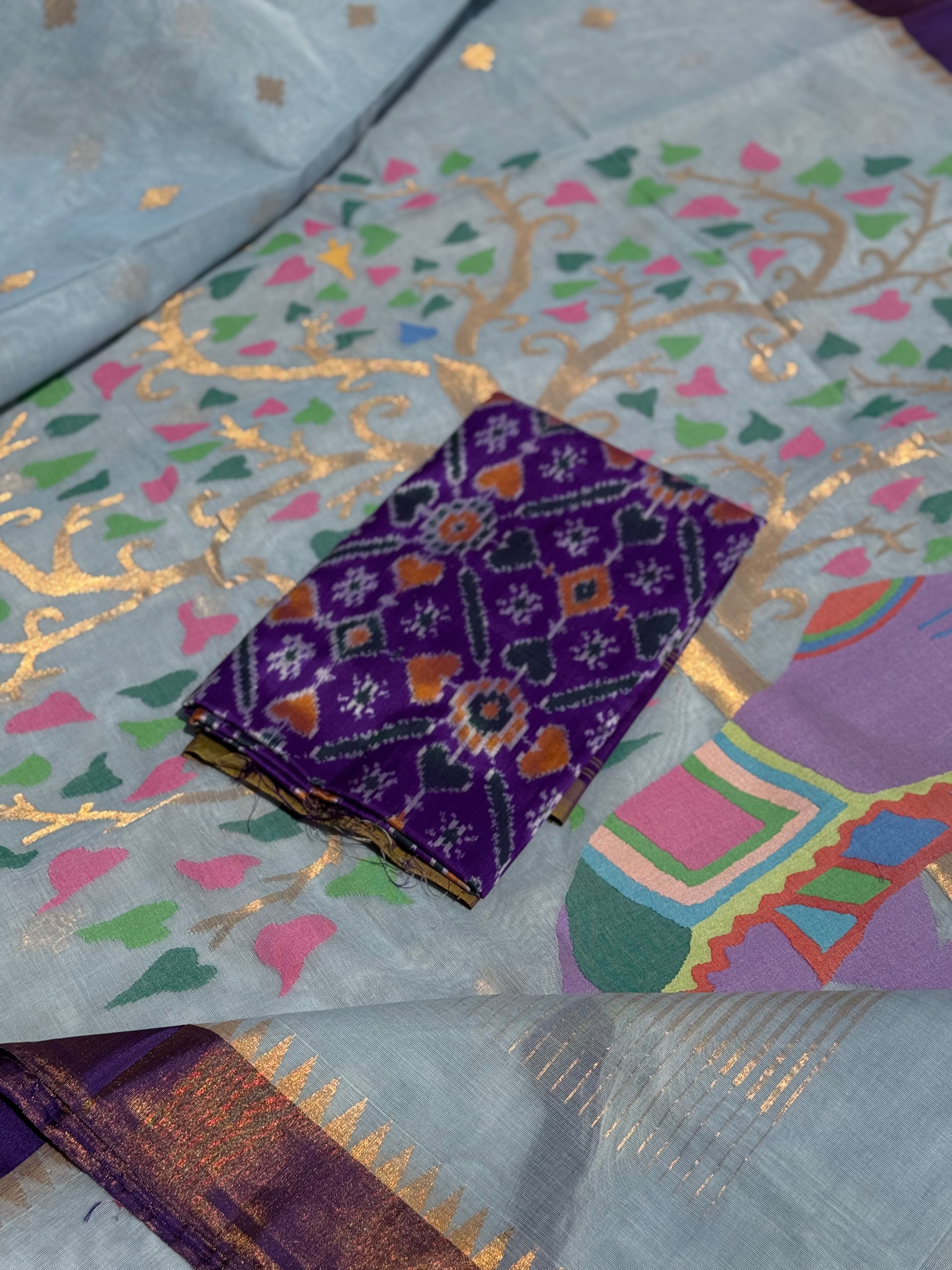A gorgeous pastel powder blue shade handspun ponduru Khadhi jamdani cotton saree