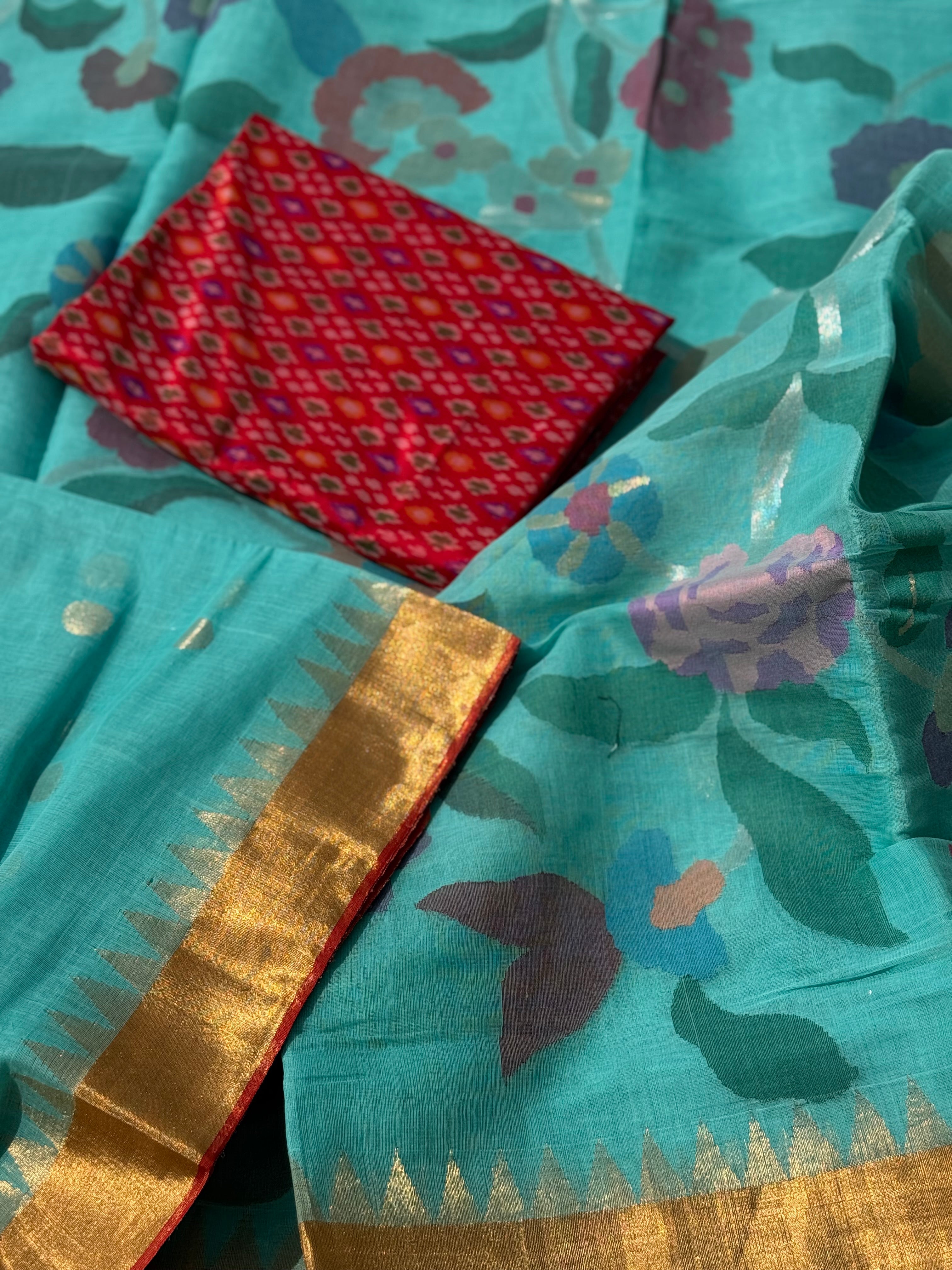 A gorgeous seafoam green shade handspun ponduru Khadhi jamdani cotton saree