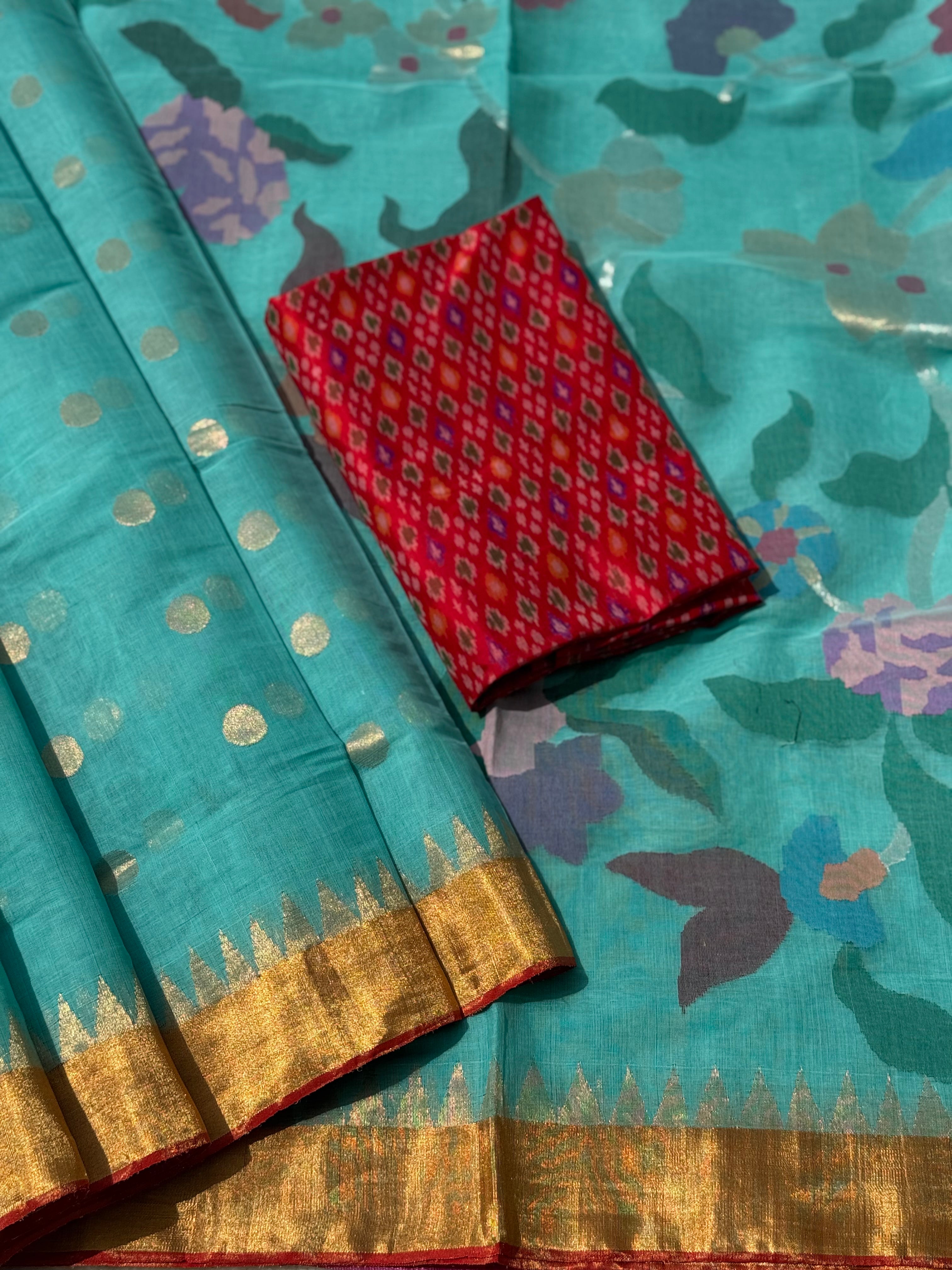 A gorgeous seafoam green shade handspun ponduru Khadhi jamdani cotton saree