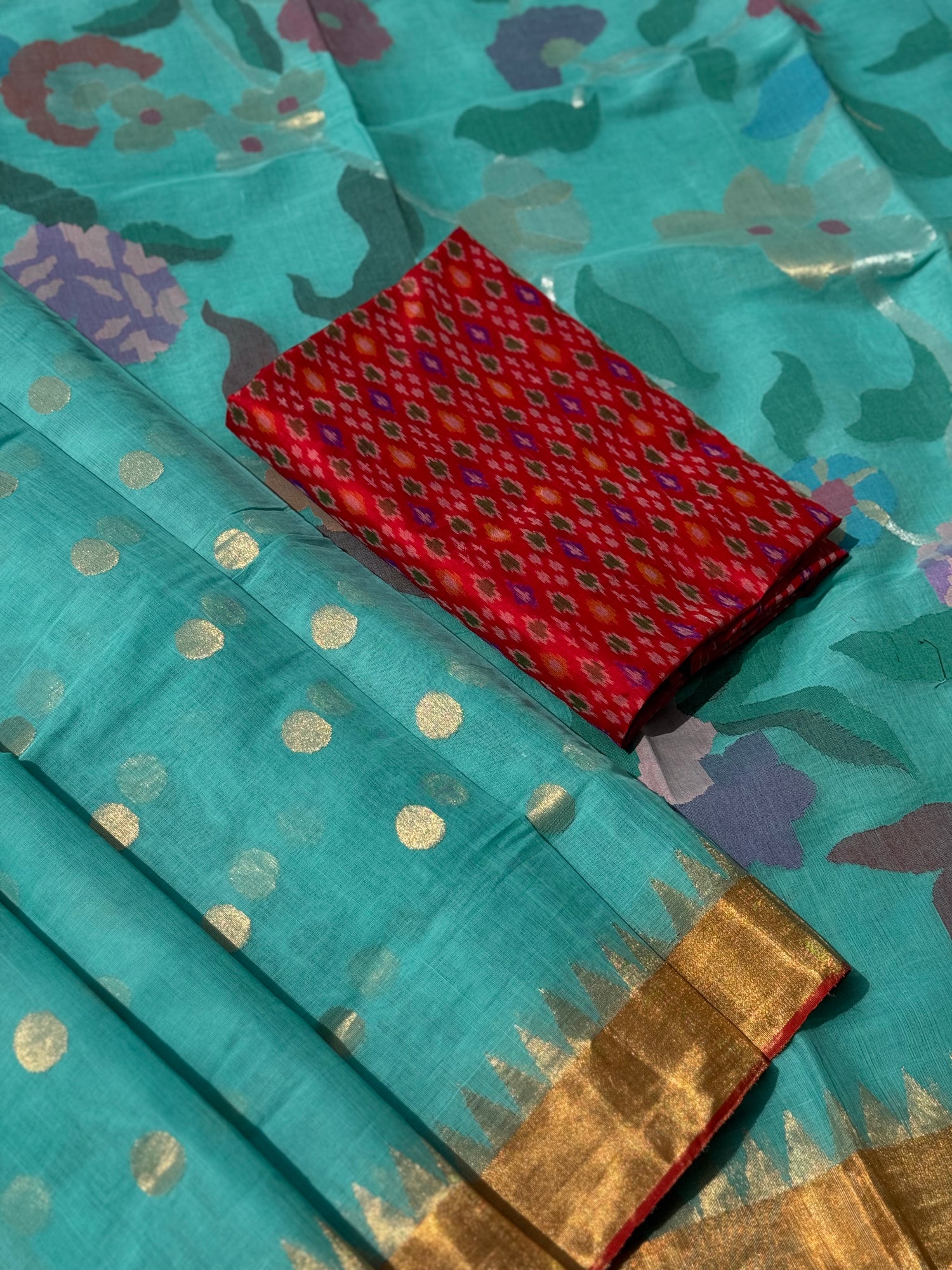 A gorgeous seafoam green shade handspun ponduru Khadhi jamdani cotton saree