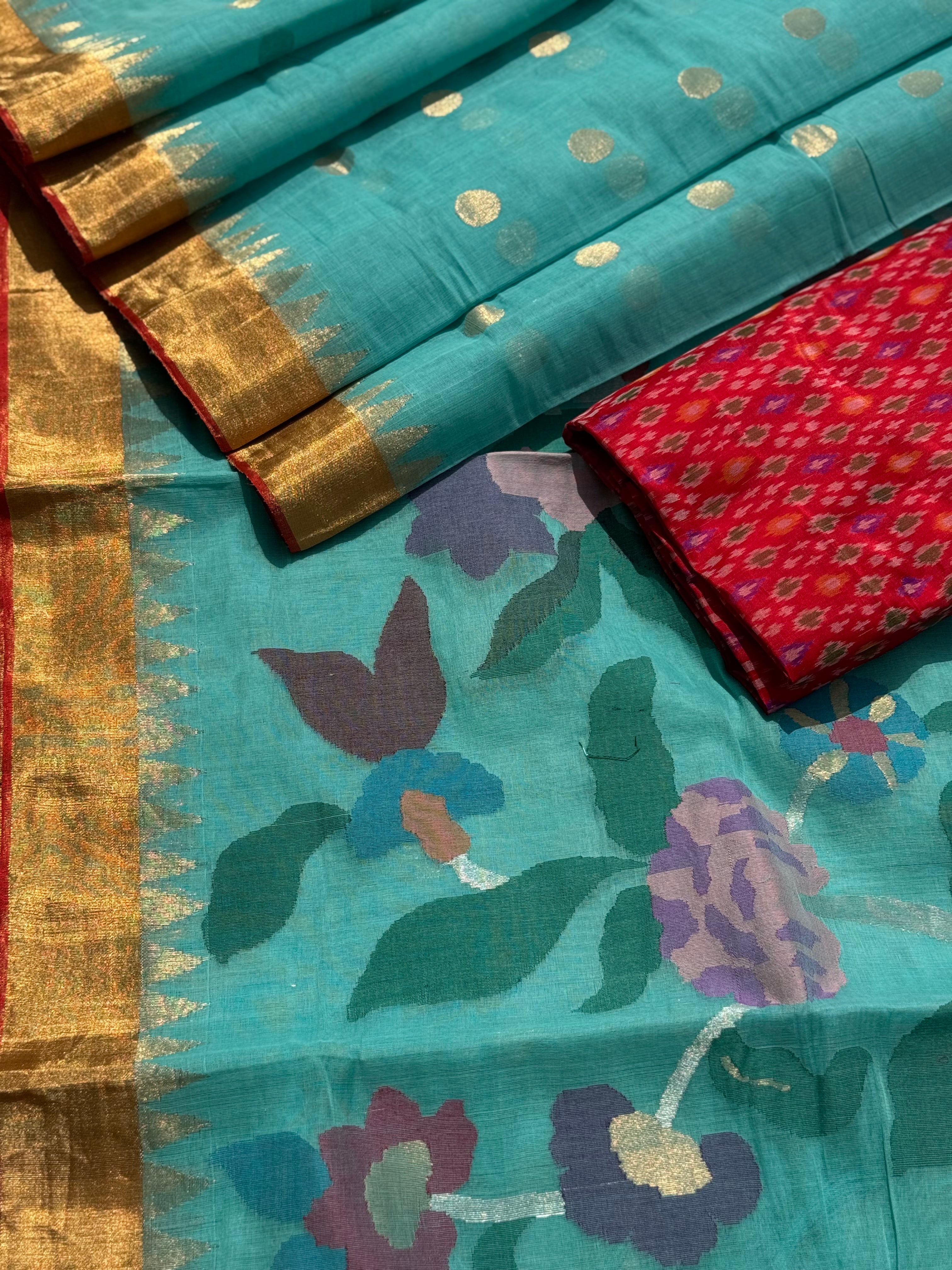 A gorgeous seafoam green shade handspun ponduru Khadhi jamdani cotton saree