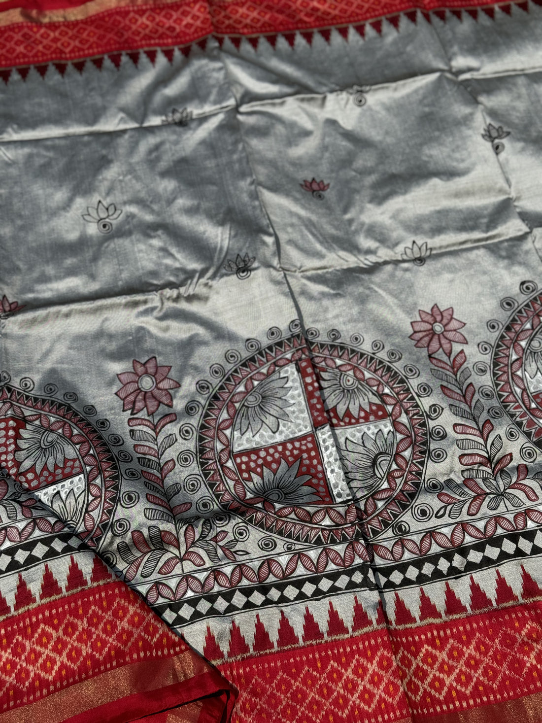 Handmade Madhubani folkart Handpainted on tie dyed ikkat woven silk saree