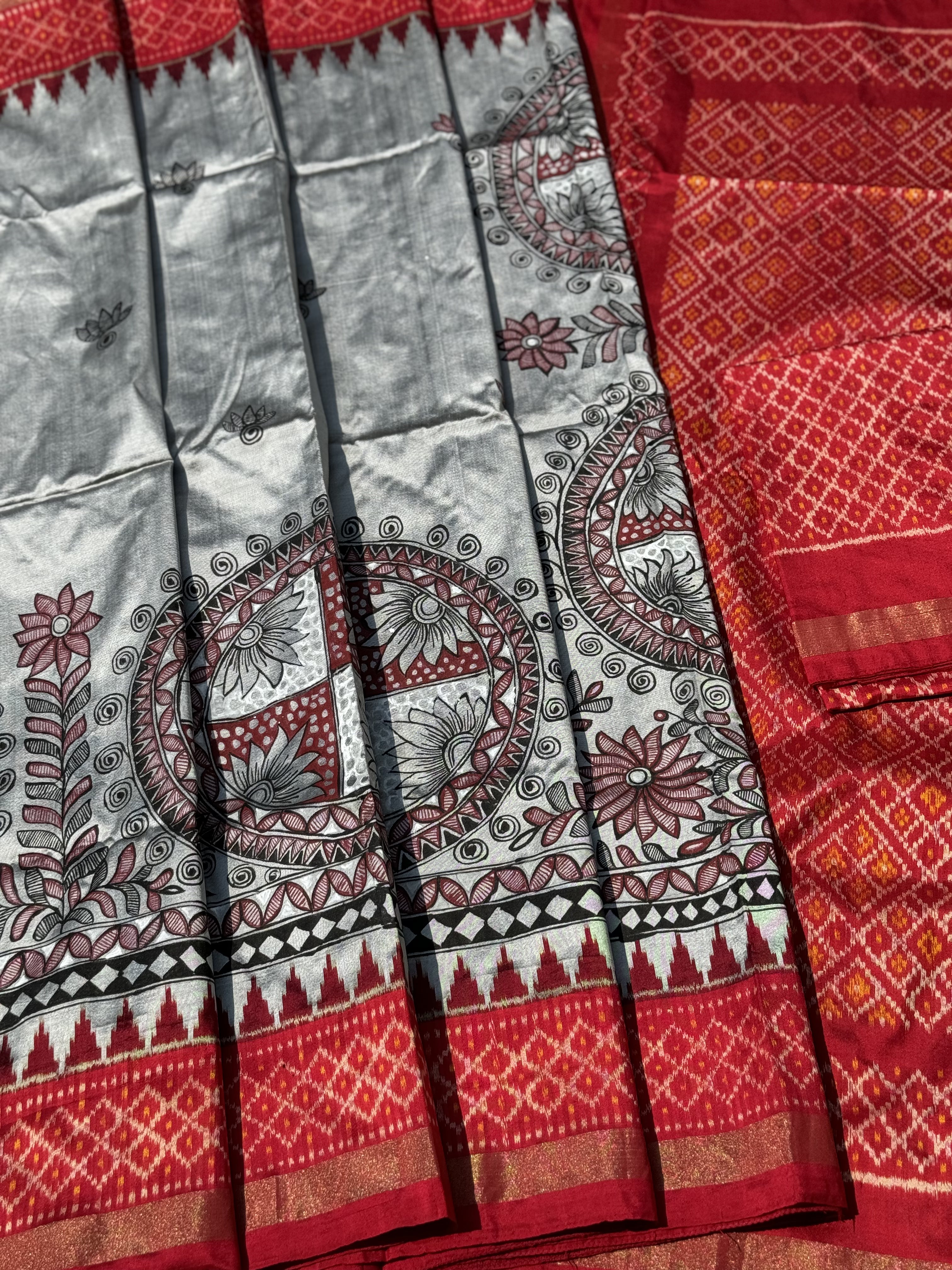 Handmade Madhubani folkart Handpainted on tie dyed ikkat woven silk saree