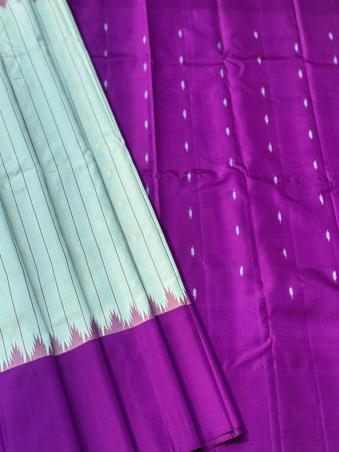 A gorgeous No Zari mint blue with magenta handwoven soft and lustrous gadwal silk saree