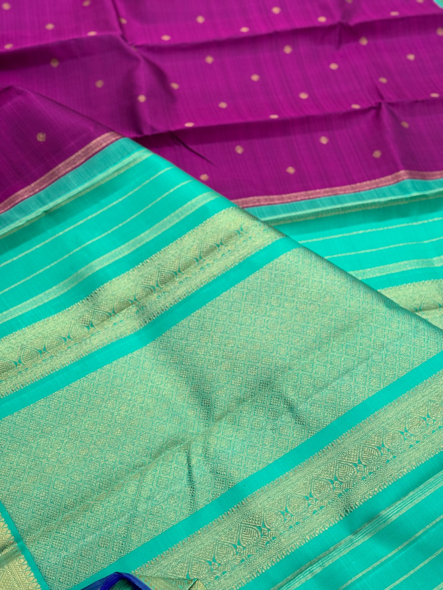 A Masterpiece kanchivaram korvai silk saree in deep plum pink with turquoise foam green