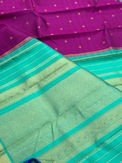 A Masterpiece kanchivaram korvai silk saree in deep plum pink with turquoise foam green