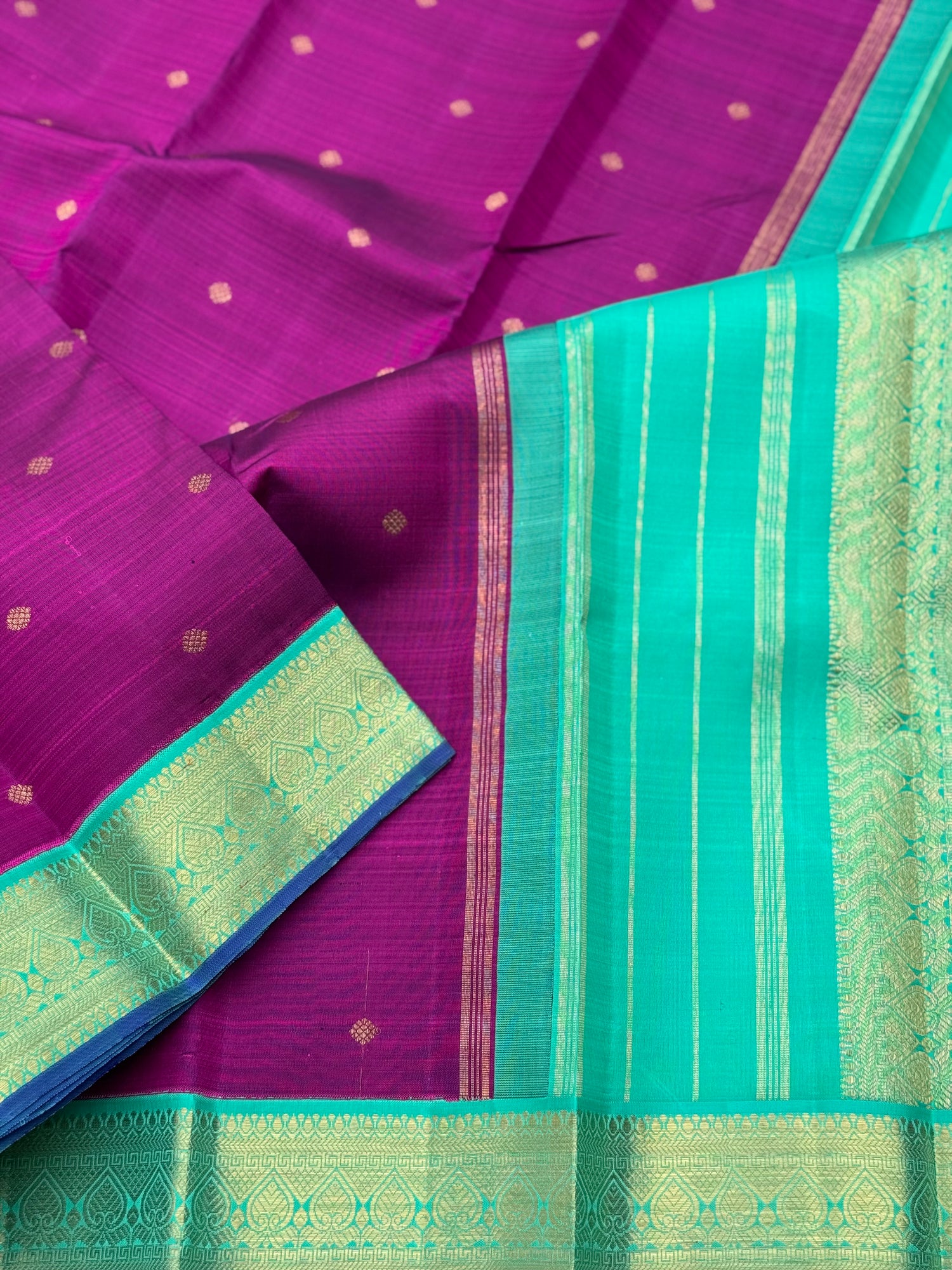 A Masterpiece kanchivaram korvai silk saree in deep plum pink with turquoise foam green