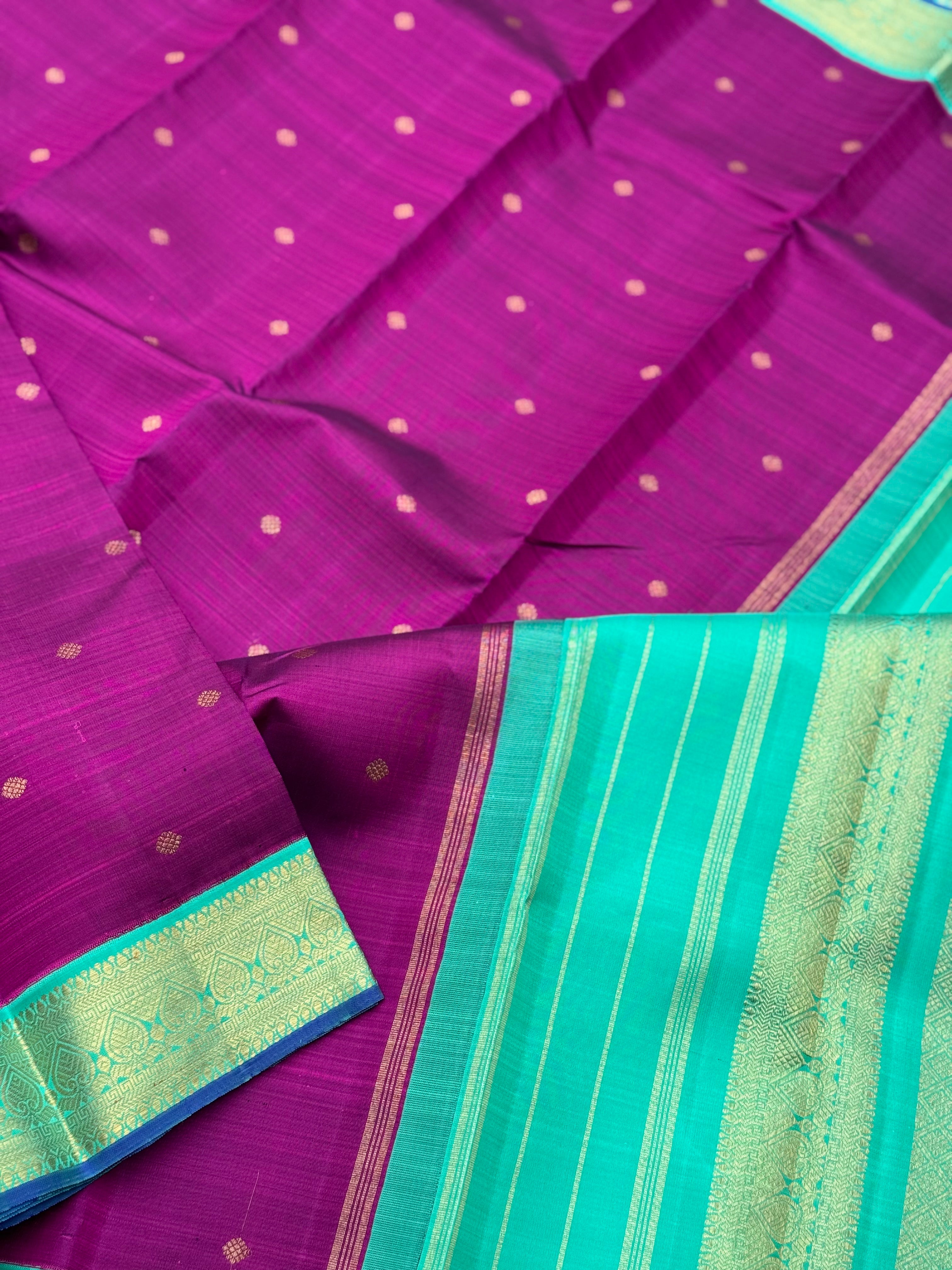 A Masterpiece kanchivaram korvai silk saree in deep plum pink with turquoise foam green