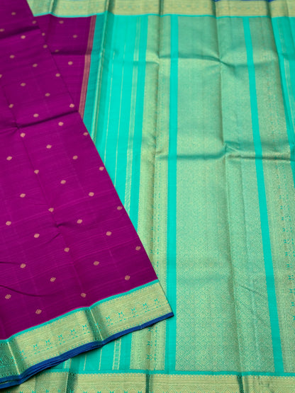 A Masterpiece kanchivaram korvai silk saree in deep plum pink with turquoise foam green