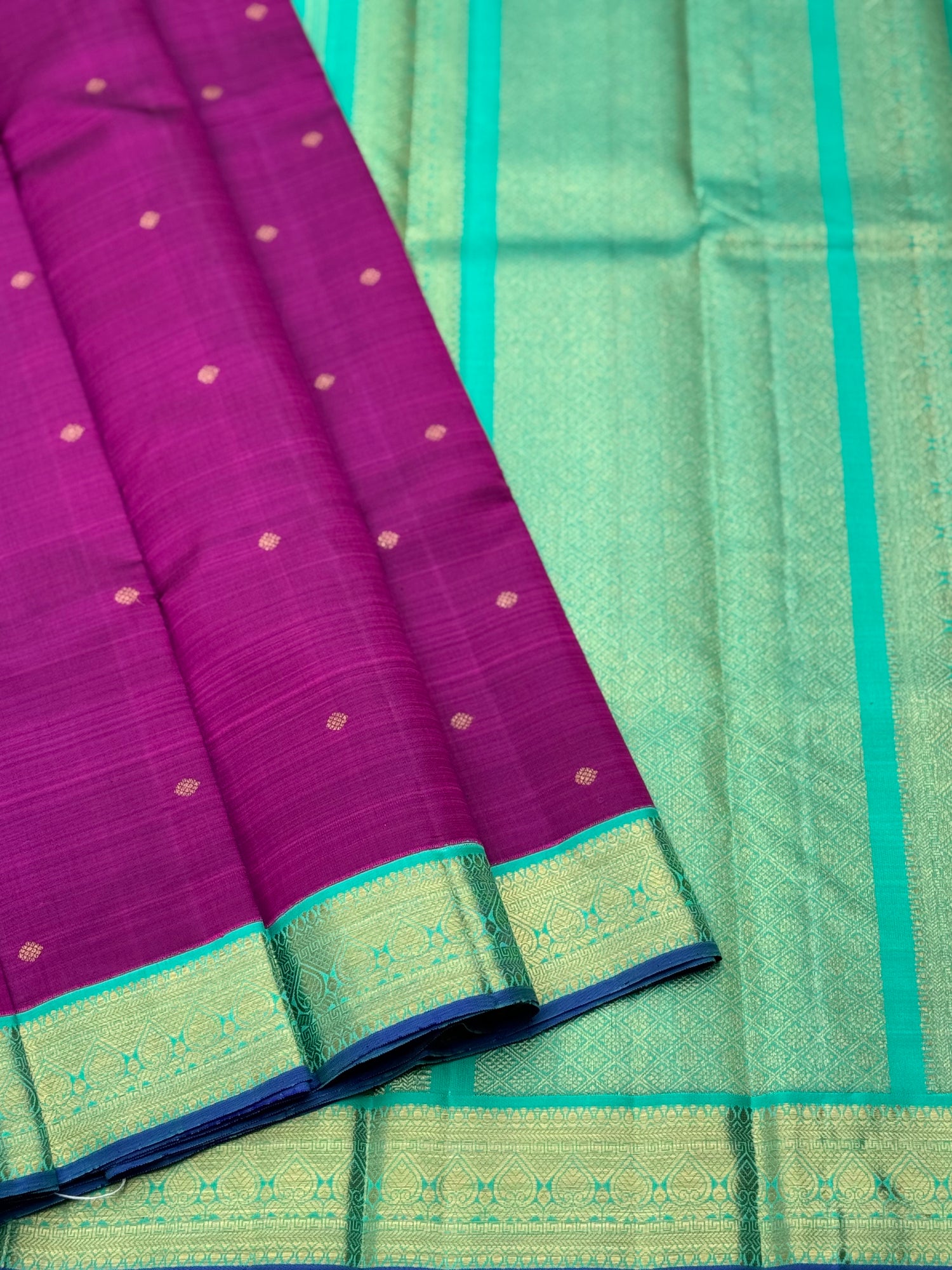 A Masterpiece kanchivaram korvai silk saree in deep plum pink with turquoise foam green