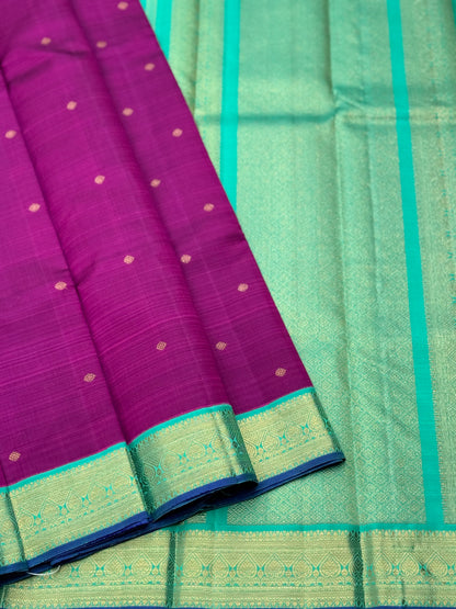 A Masterpiece kanchivaram korvai silk saree in deep plum pink with turquoise foam green