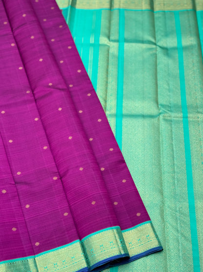 A Masterpiece kanchivaram korvai silk saree in deep plum pink with turquoise foam green