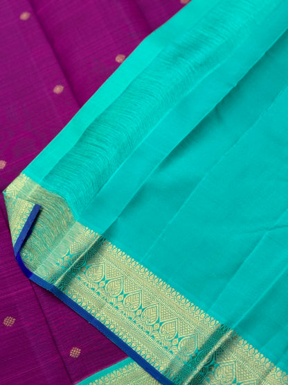 A Masterpiece kanchivaram korvai silk saree in deep plum pink with turquoise foam green