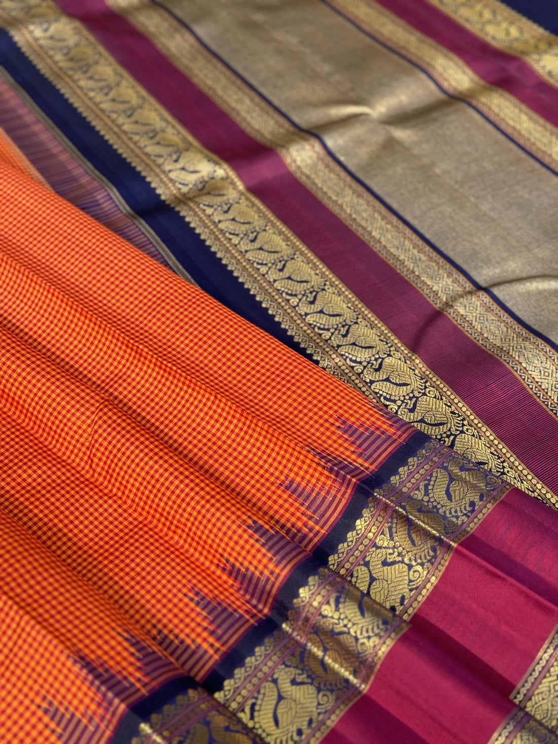 KADHAMBAM KANCHI - A grandeur burnt orange with deep navy blue korvai temple  and zari border kanchivaram silk SAREE