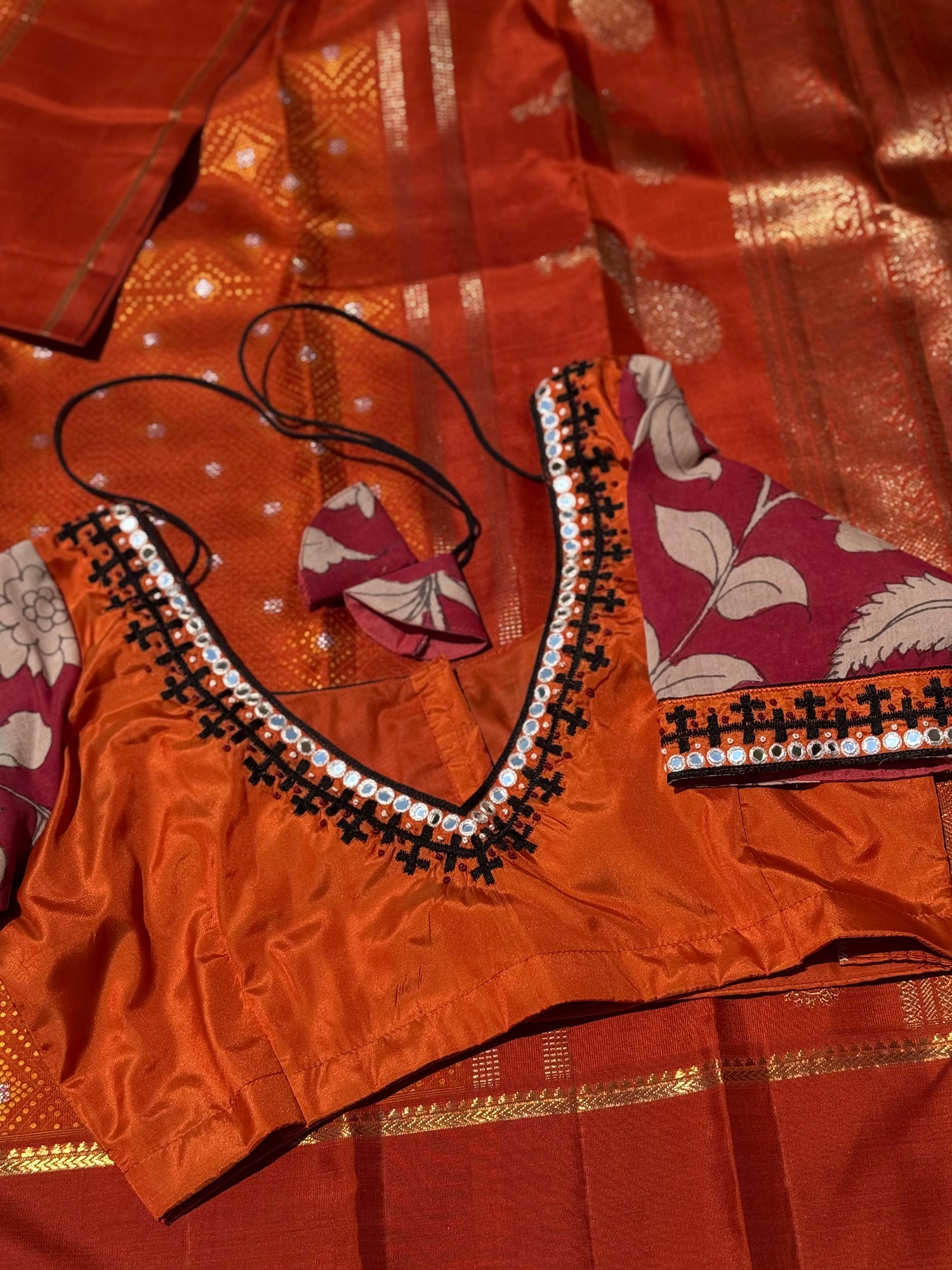 Rust orange with maroon silk blouse handdrawn hand painted penkalamkari and zardosi embellished