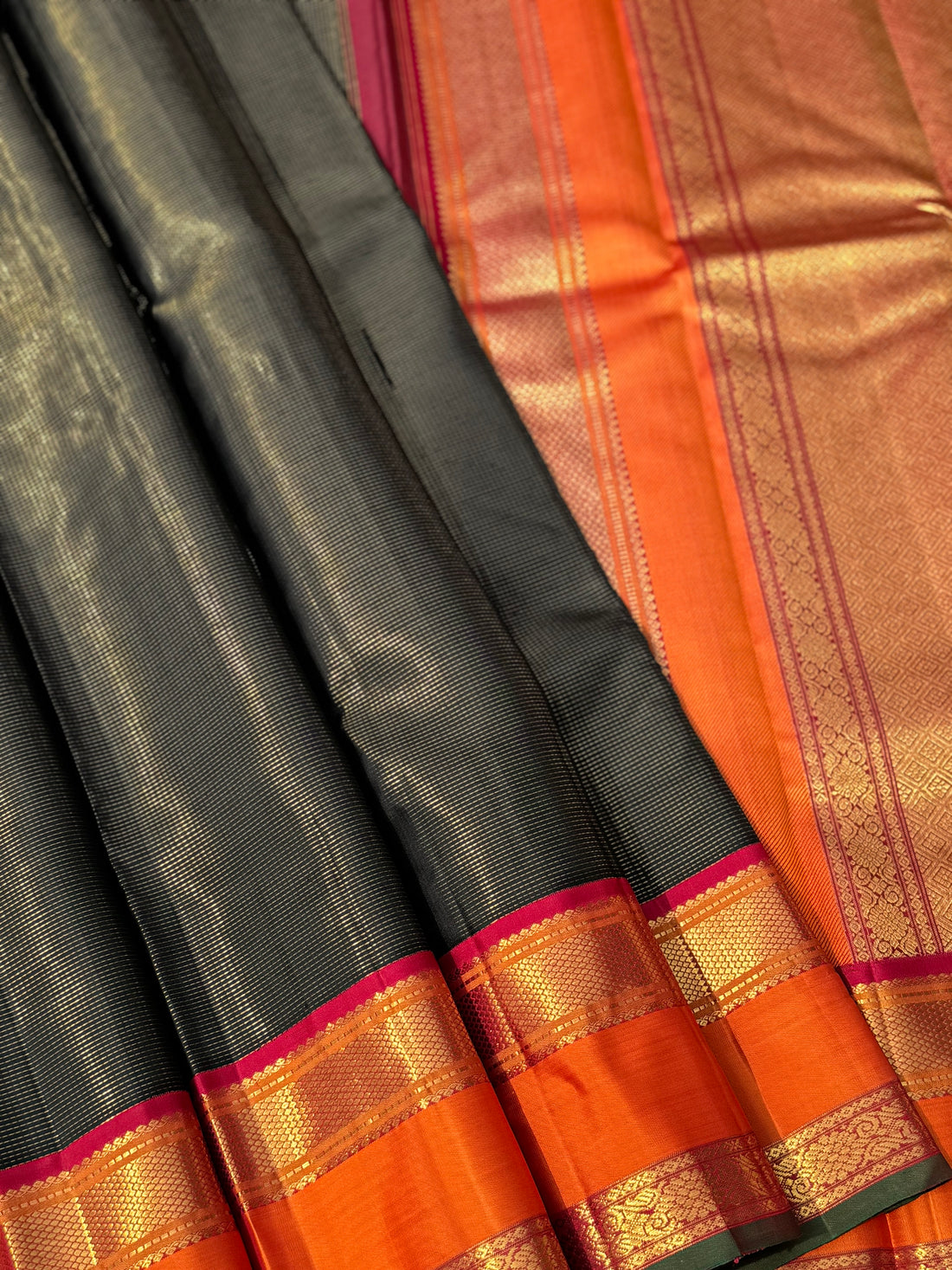 A granduer stark black with orange zari muthu seer kanchivaram silk saree