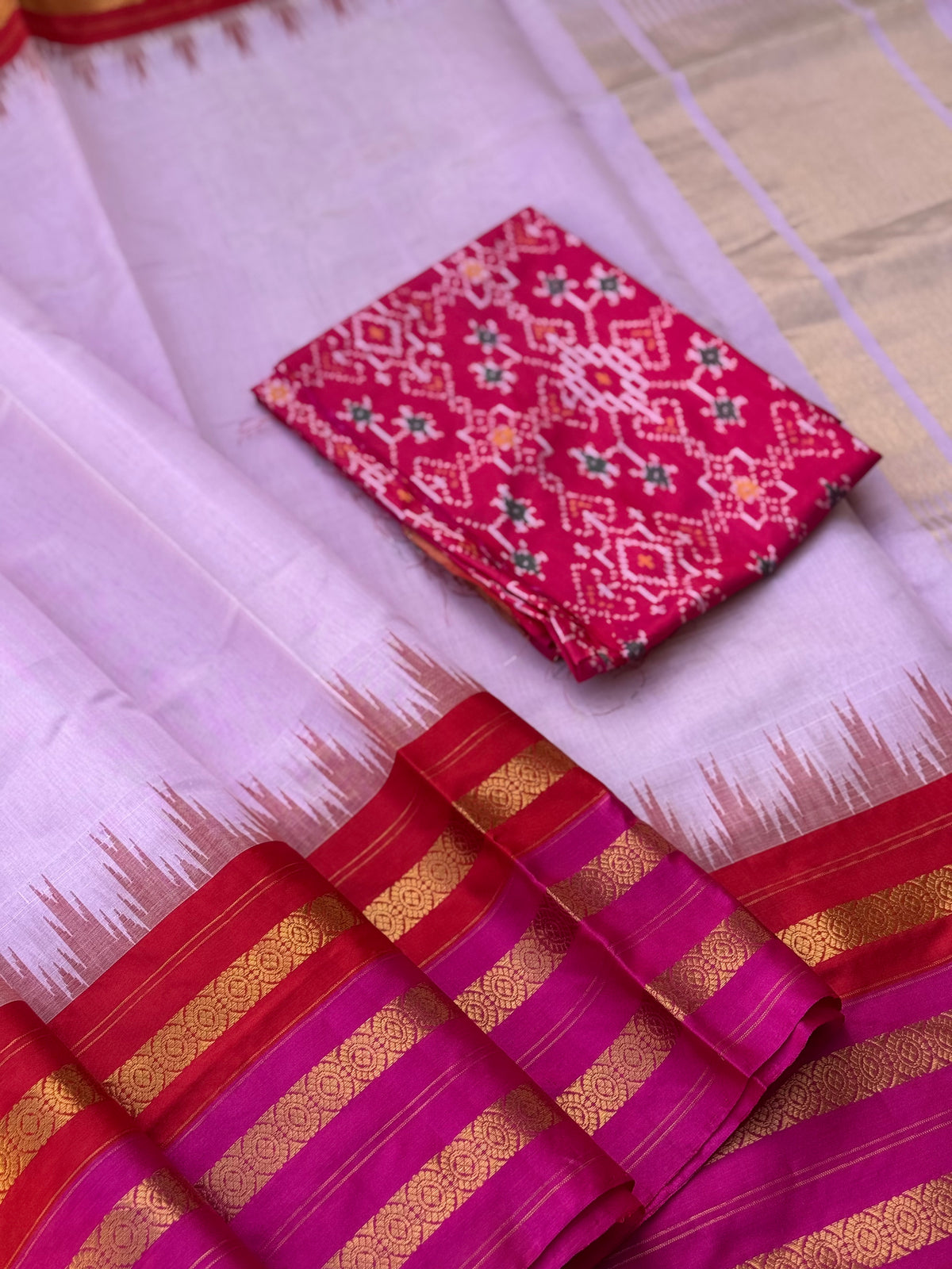Handspun and handwoven ponduru Khadhi by silk saree with silk border in contrast red and pink jacquard weave