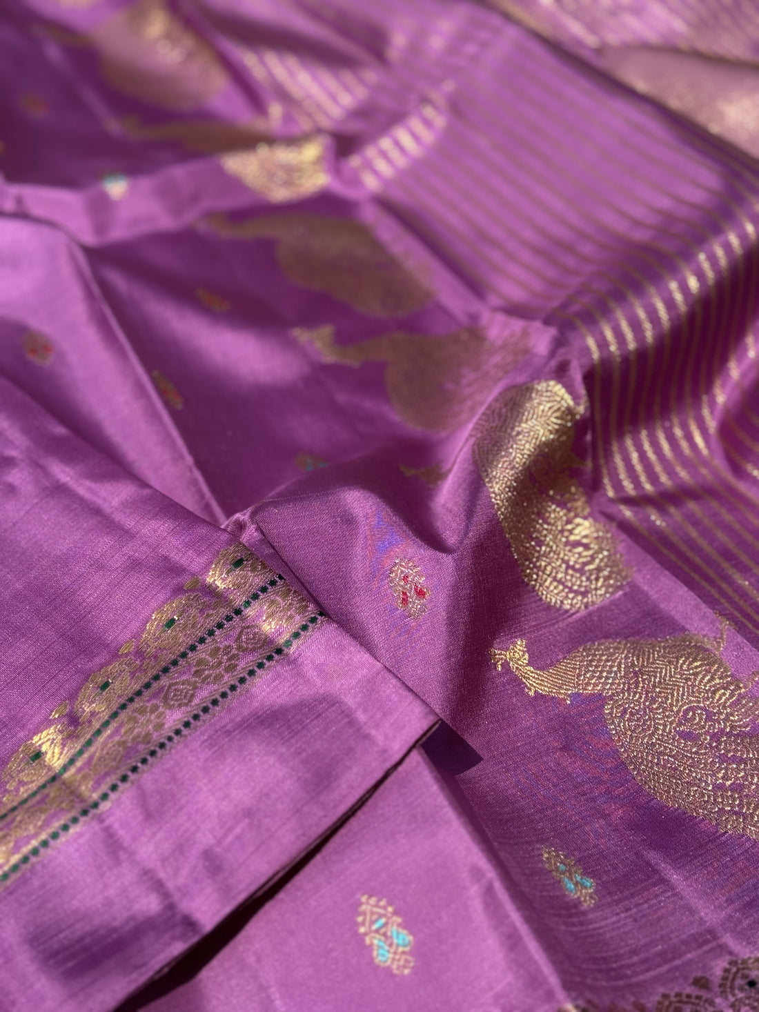Masterpiece Lilac shade Kanchivaram silk saree with Magnificent peacock Pallu