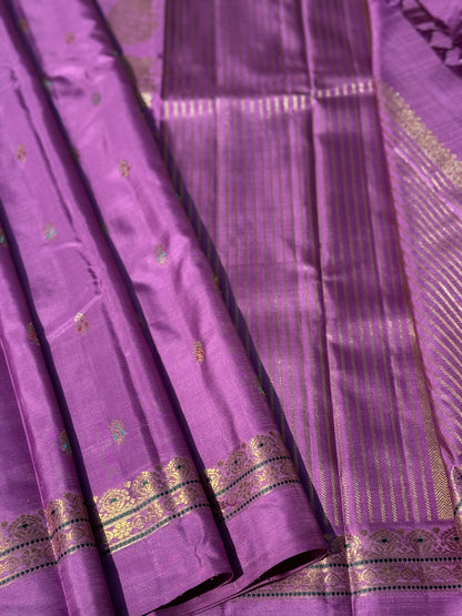 Masterpiece Lilac shade Kanchivaram silk saree with Magnificent peacock Pallu