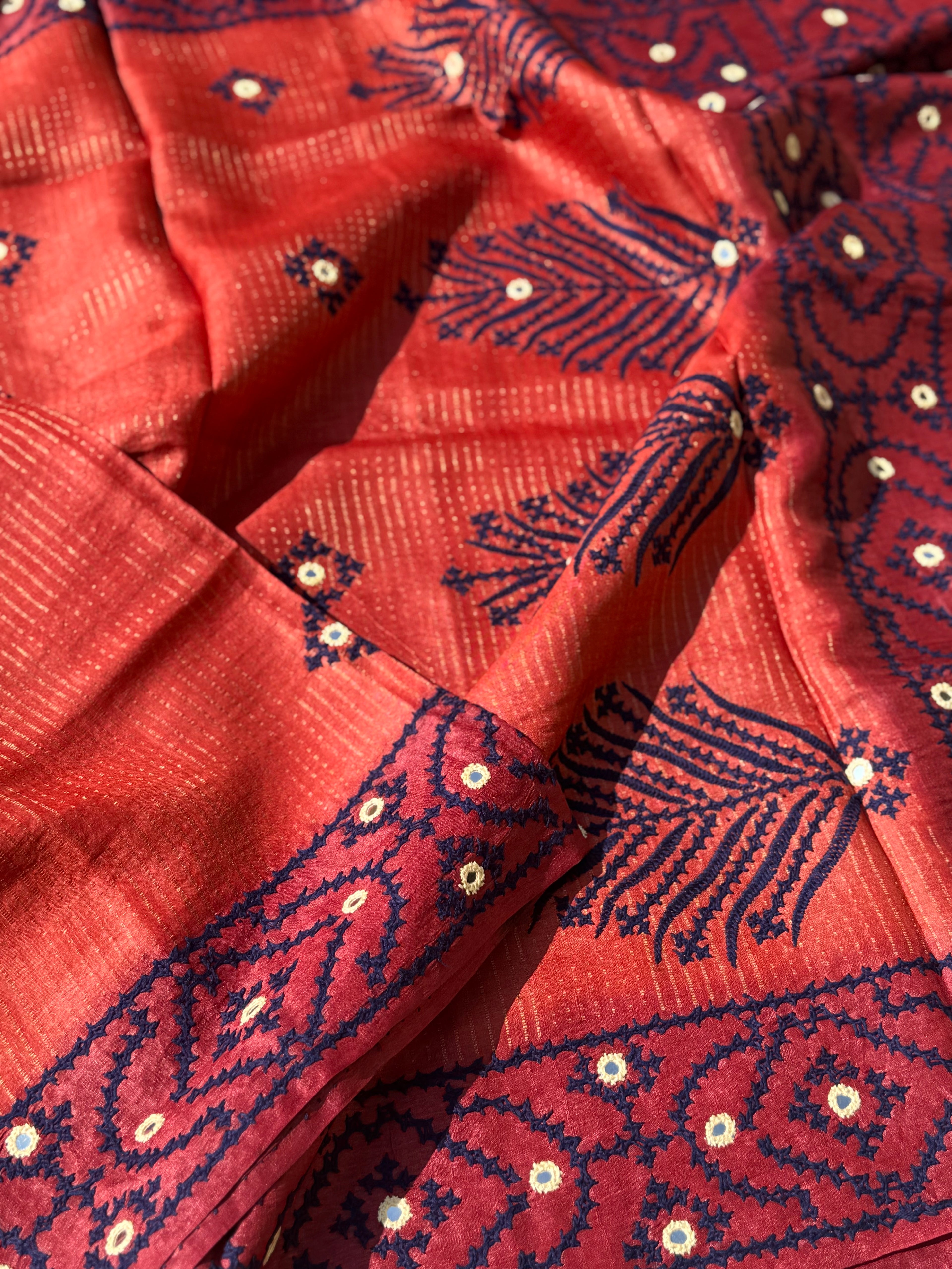 Brick red handwoven Tussar silk saree with handmade kutch mirror embroidery work