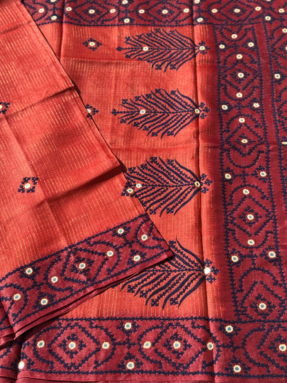 Brick red handwoven Tussar silk saree with handmade kutch mirror embroidery work