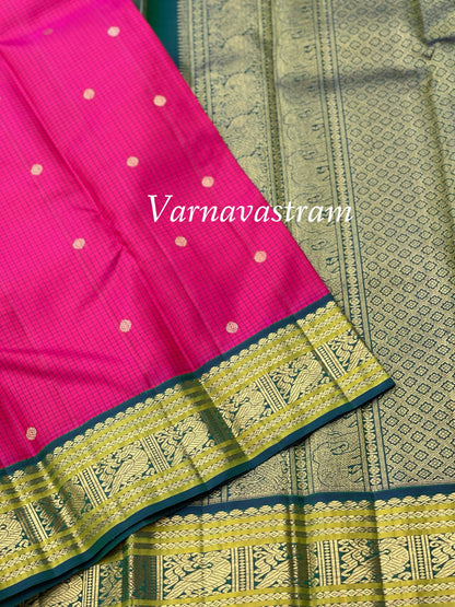 A Deep Fuchsia pink with green border Kanchivaram Silk saree