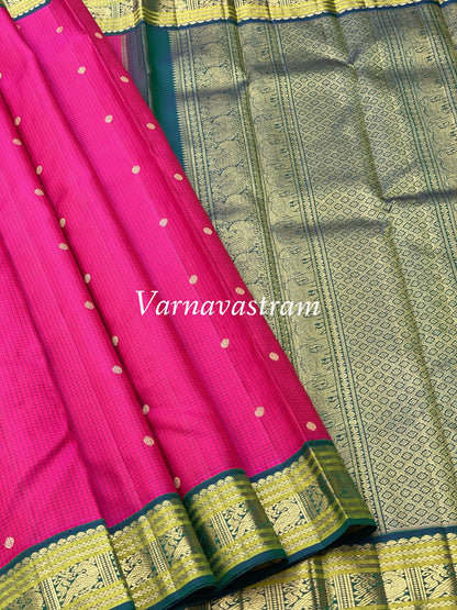 A Deep Fuchsia pink with green border Kanchivaram Silk saree