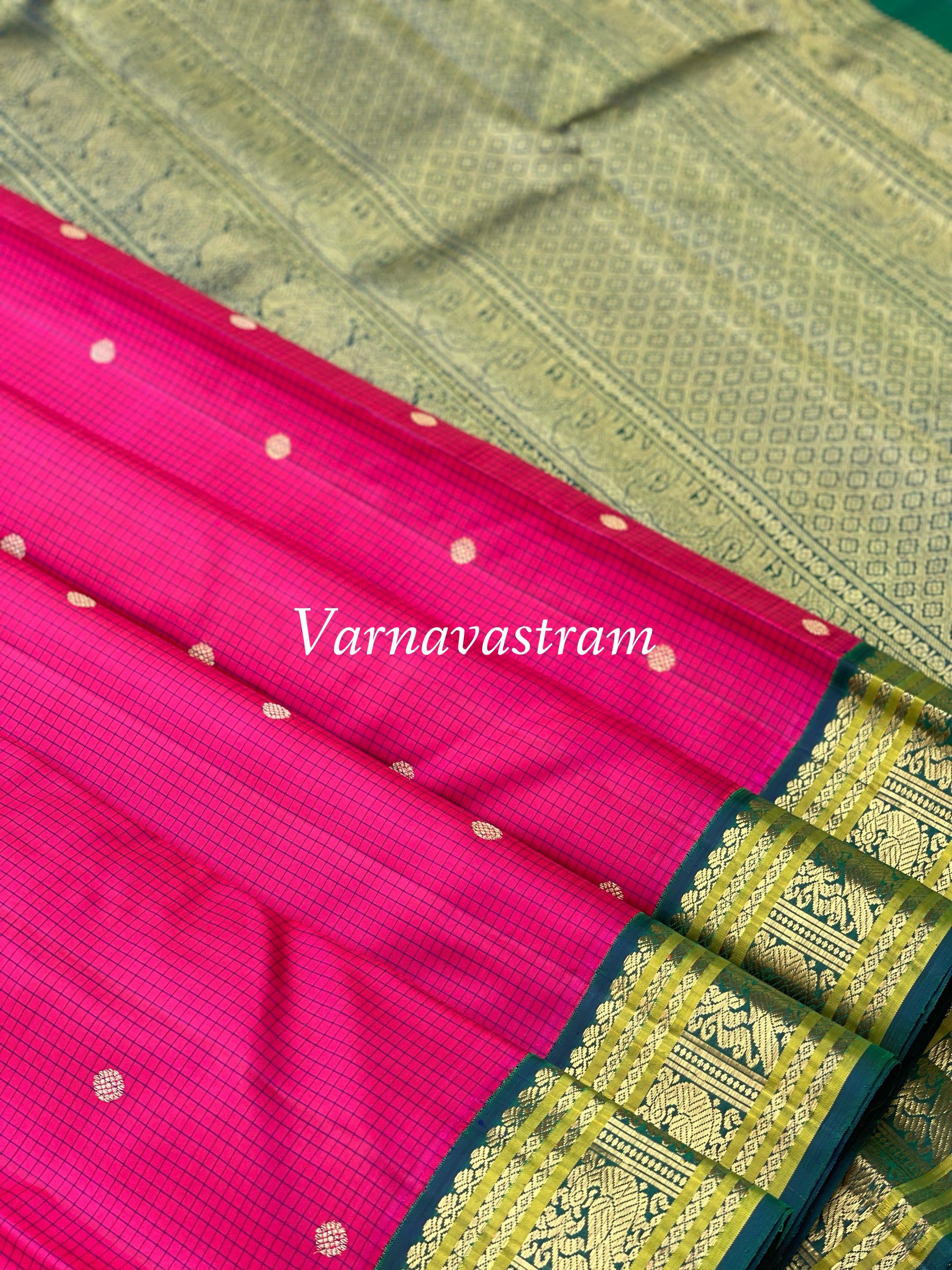 A Deep Fuchsia pink with green border Kanchivaram Silk saree