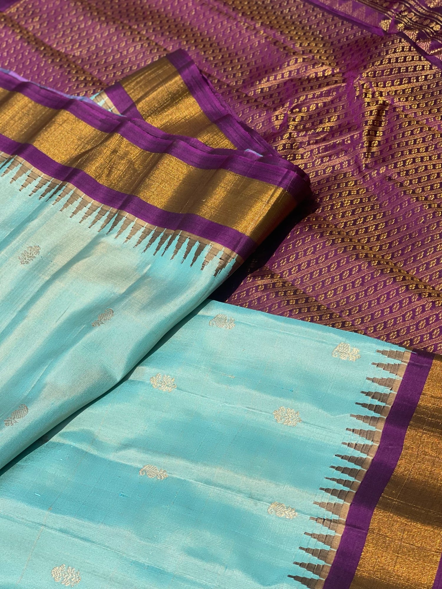 Handwoven Gadwal Silk With Temple Border, Plain Body And Grand Pallu Saree