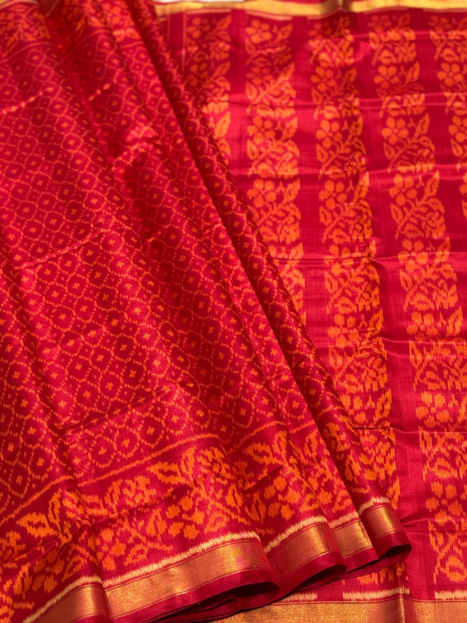 A gorgeous burnt orange with red shade single ikkat patola silk SAREE