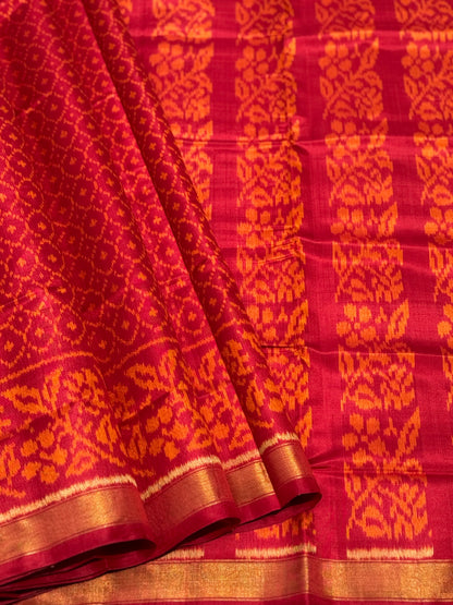 A gorgeous burnt orange with red shade single ikkat patola silk SAREE