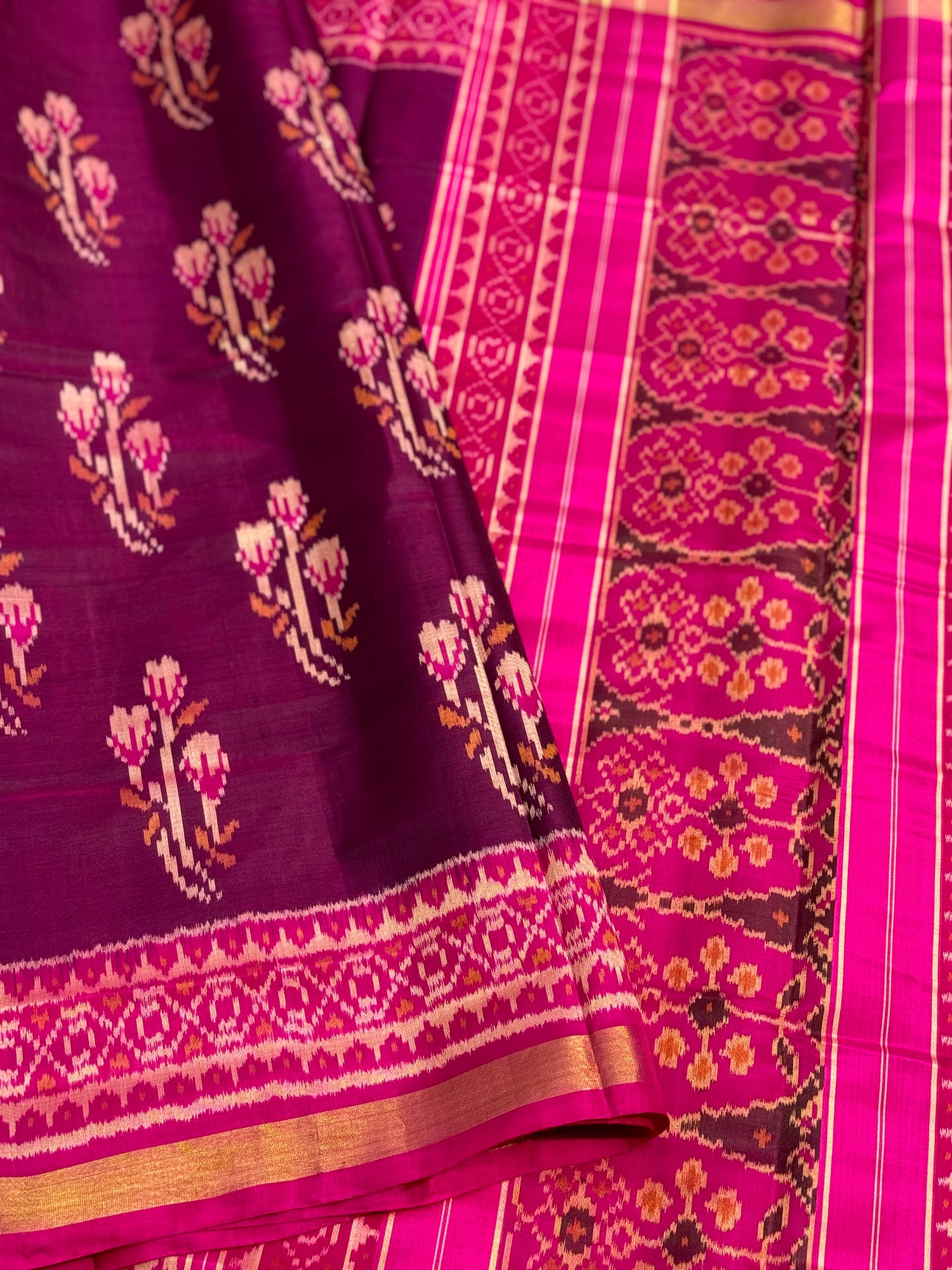 A gorgeous plum pink shade single ikkat patola silk SAREE