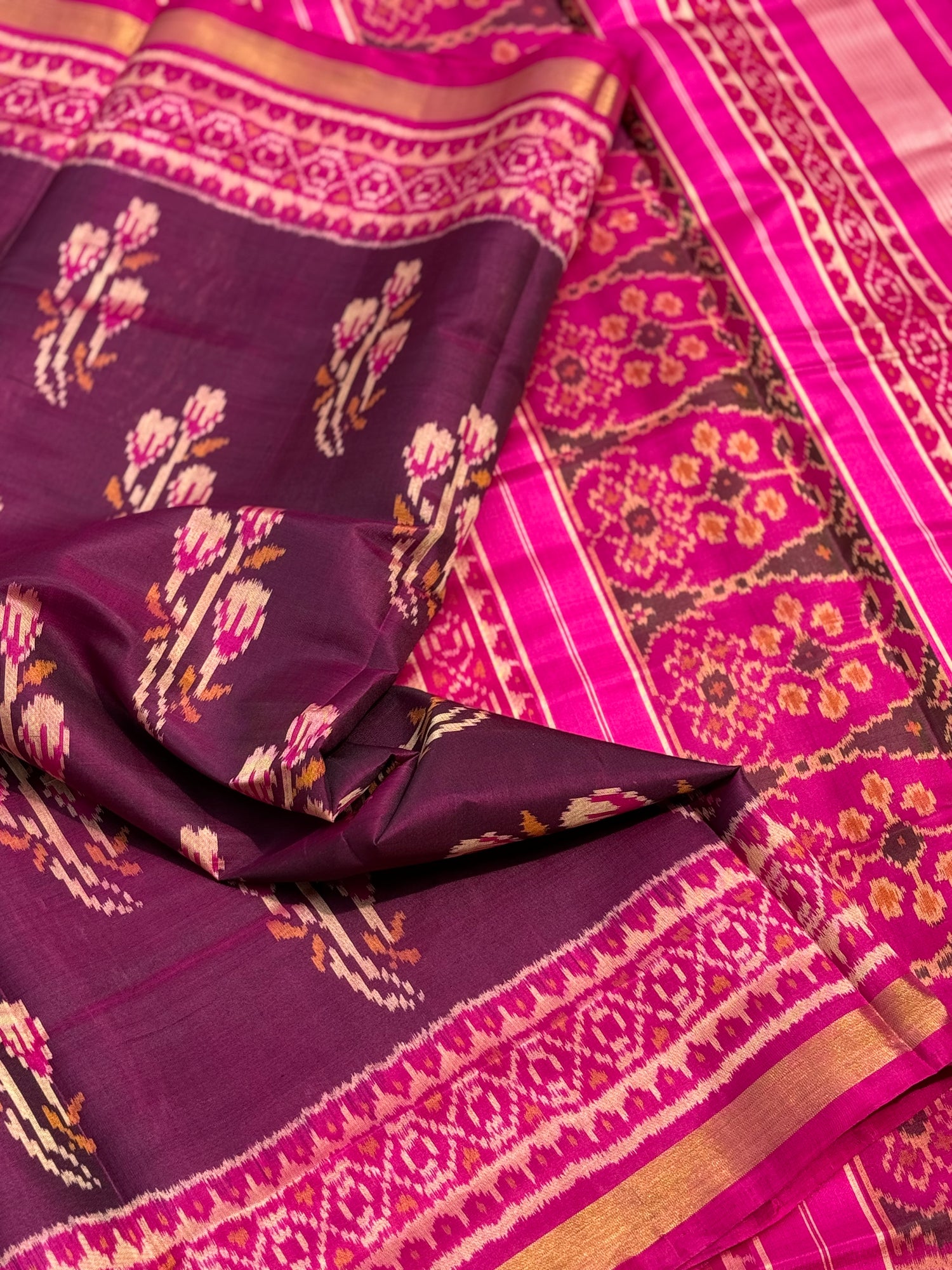 A gorgeous plum pink shade single ikkat patola silk SAREE