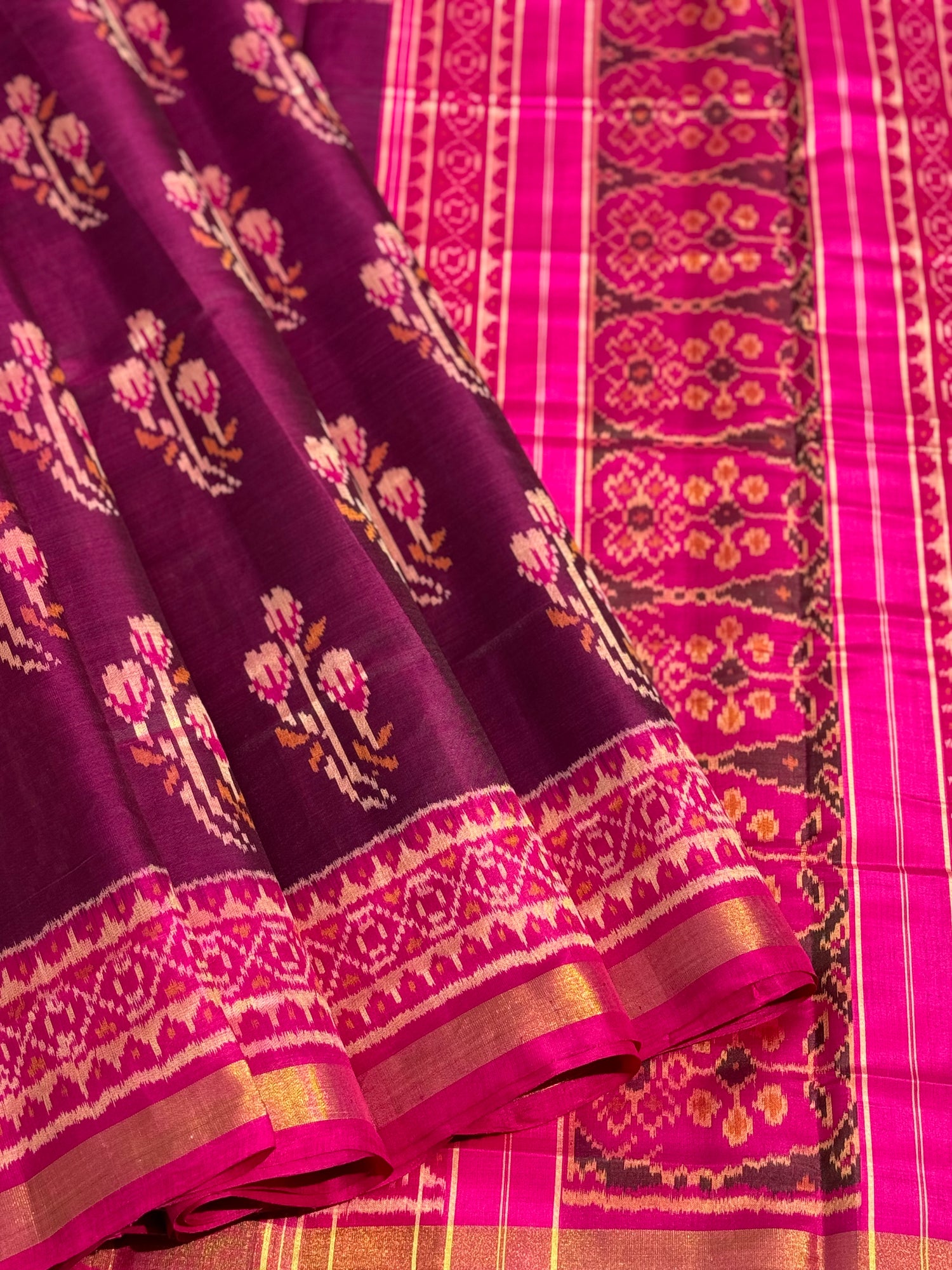 A gorgeous plum pink shade single ikkat patola silk SAREE