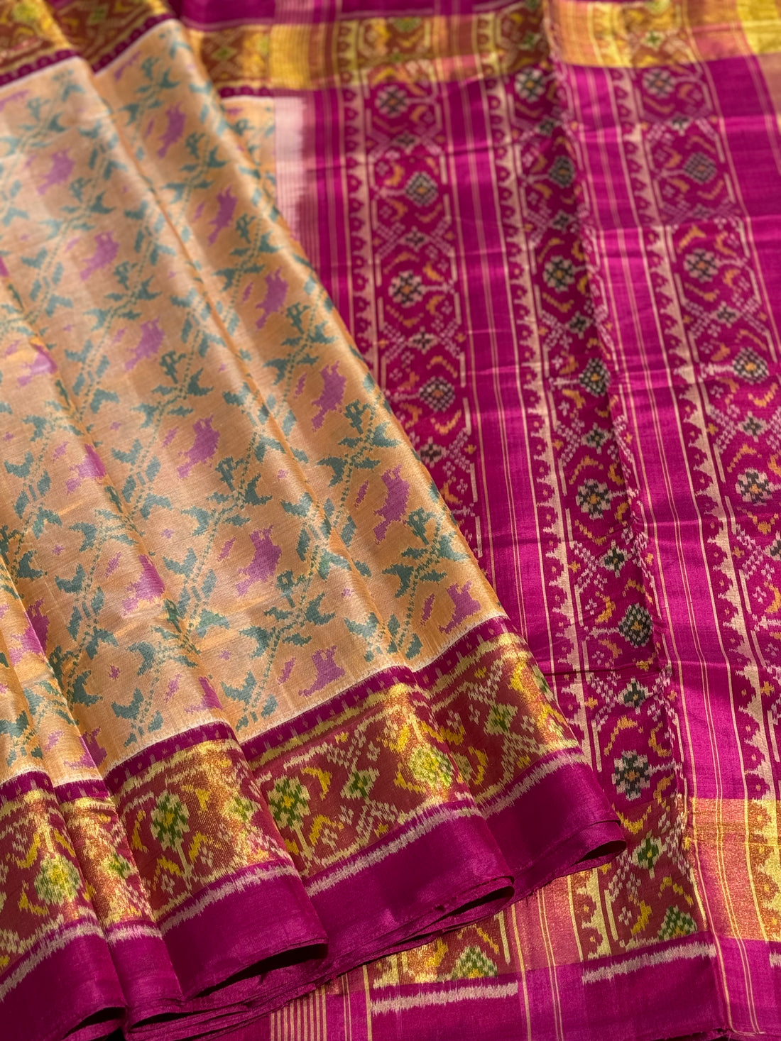 A gorgeous beige gold shade single ikkat patola silk SAREE