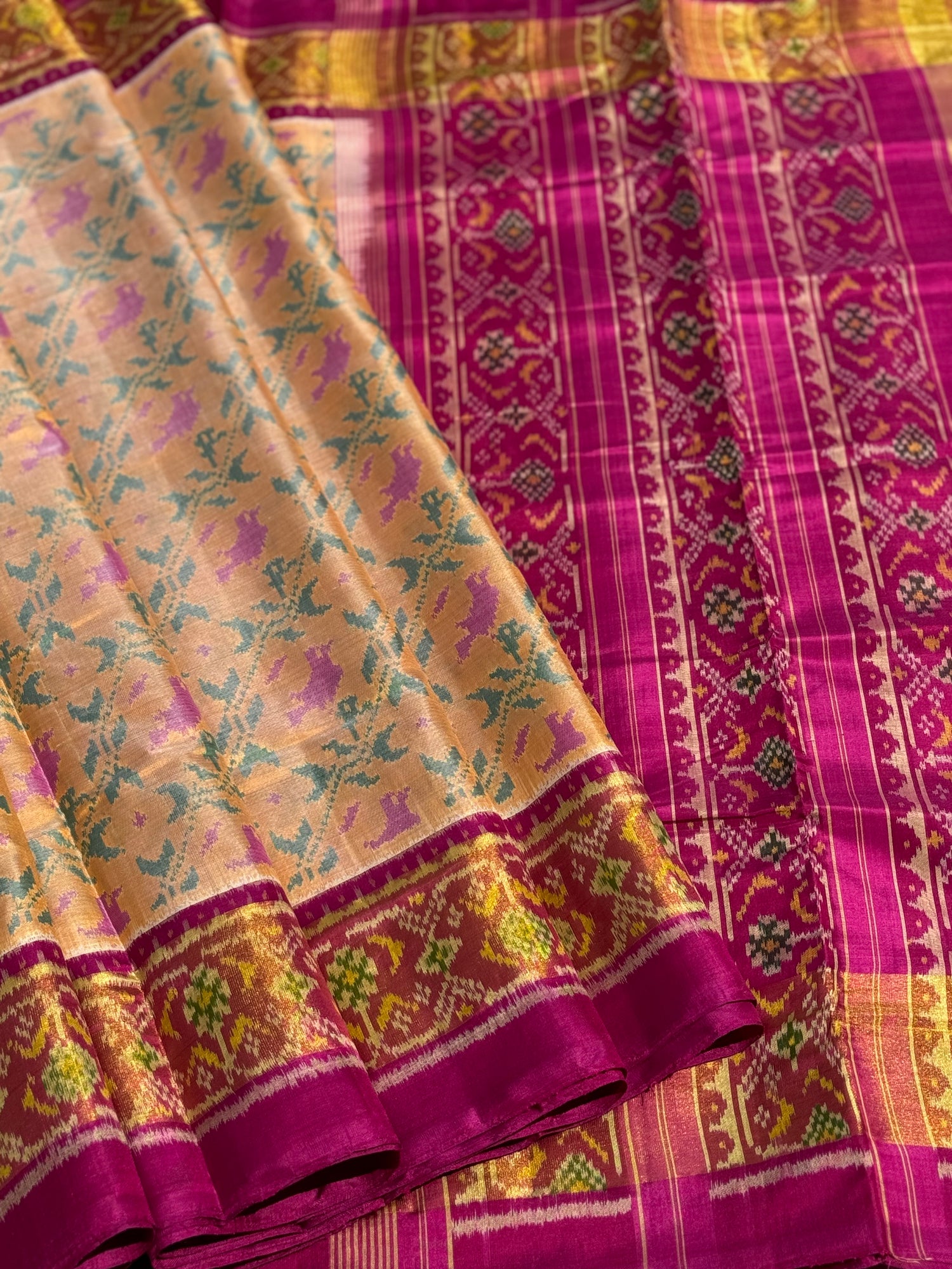 A gorgeous beige gold  shade single ikkat patola silk SAREE