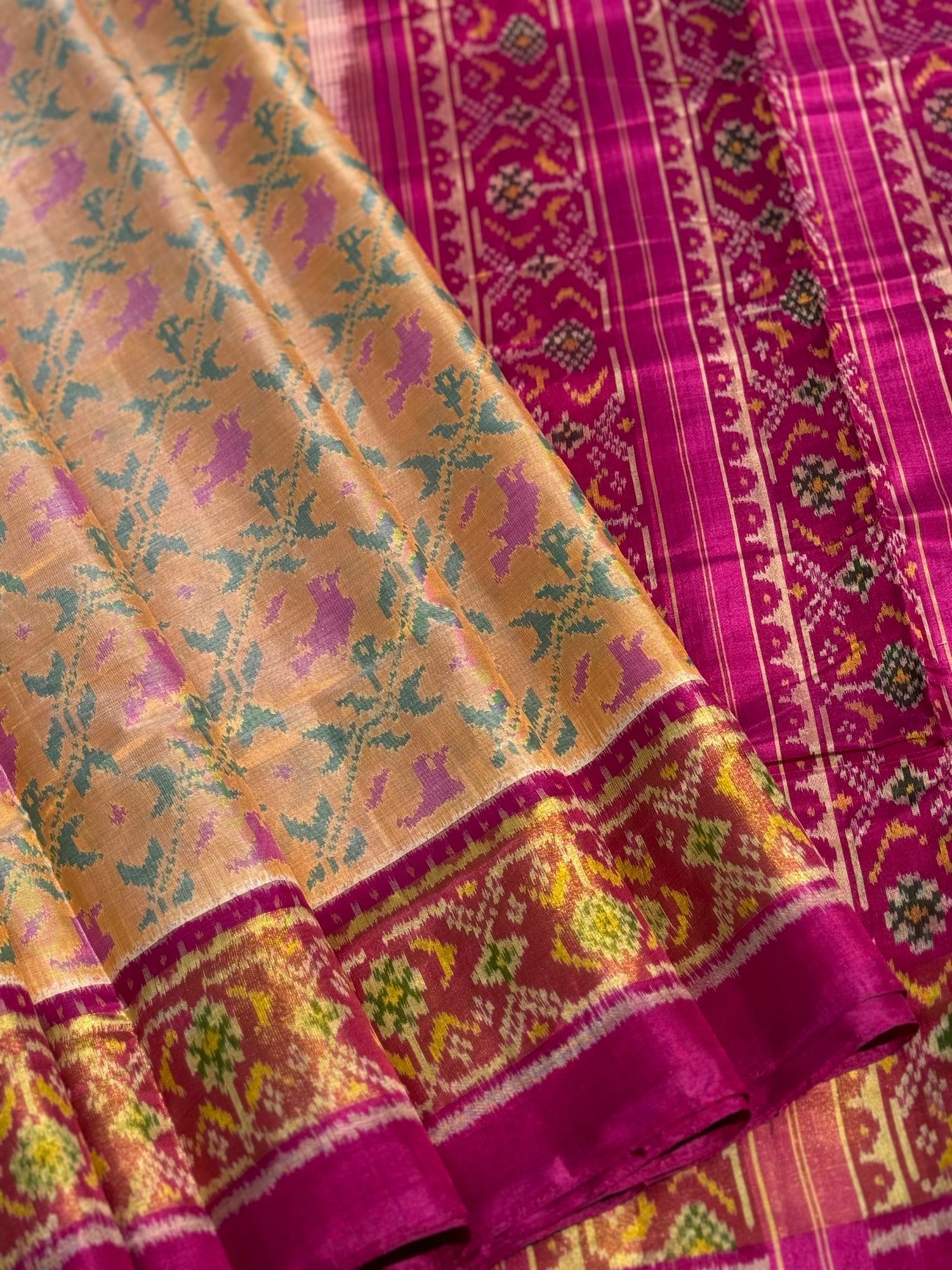 A gorgeous beige gold  shade single ikkat patola silk SAREE