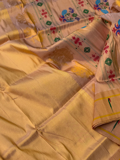 A stunner showstopper Handloom paithani tissue silk saree with single muniya border