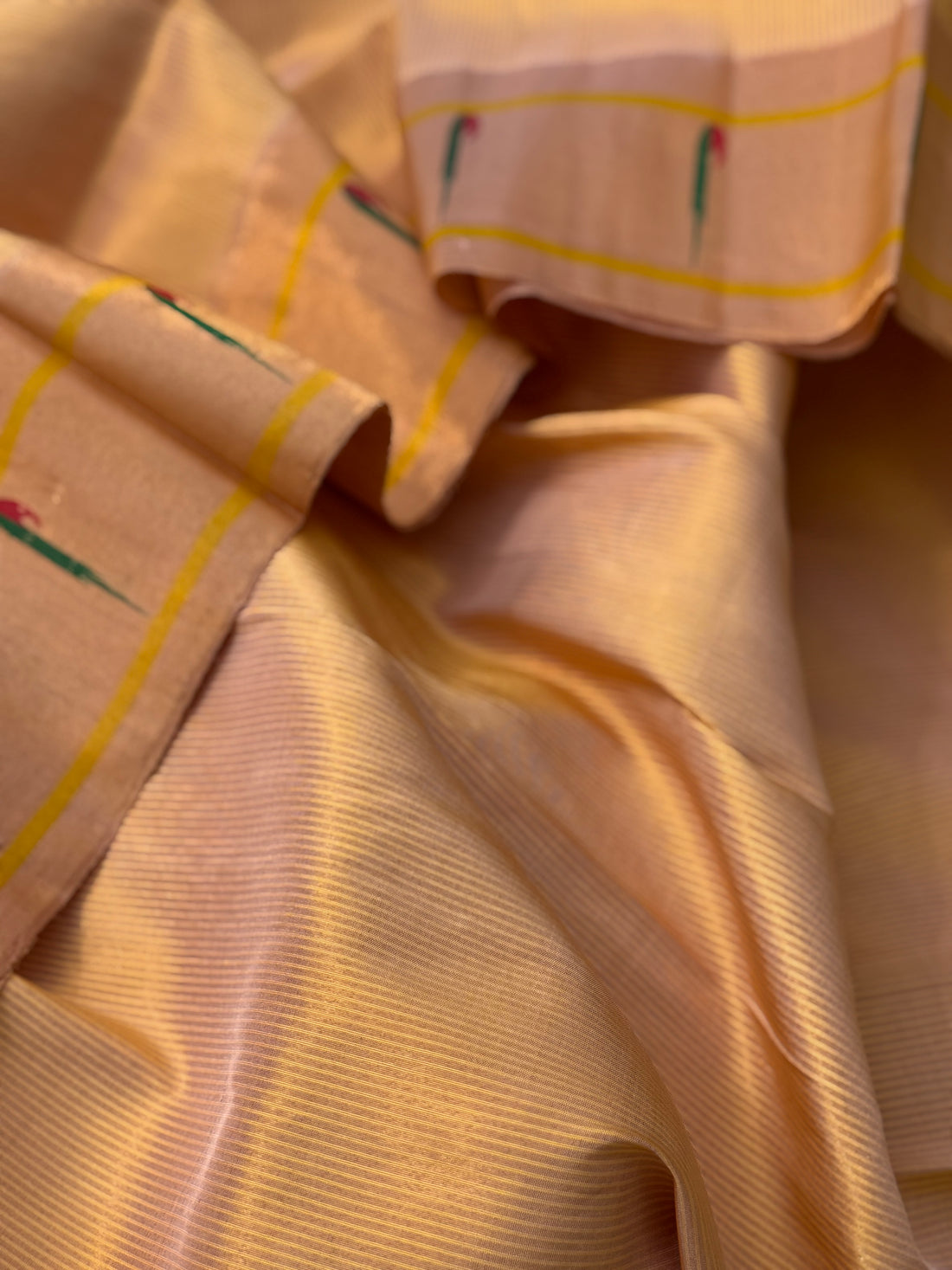 A stunner showstopper Handloom paithani tissue silk saree with single muniya border