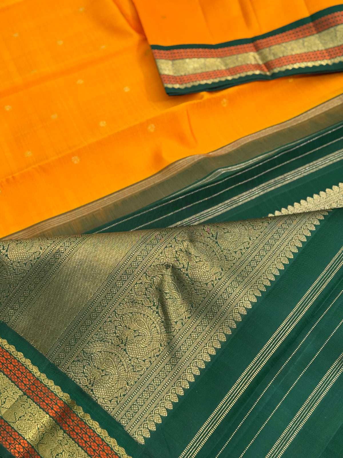 A Masterpiece kanchivaram korvai silk saree in mambazha yellow and bottle green