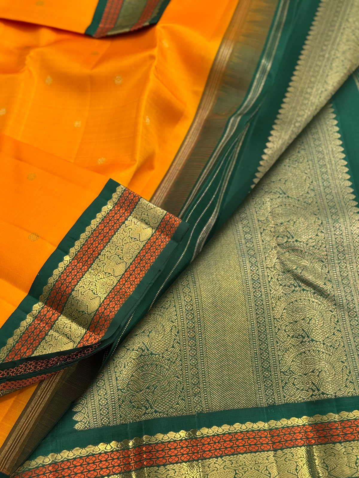 A Masterpiece kanchivaram korvai silk saree in mambazha yellow and bottle green