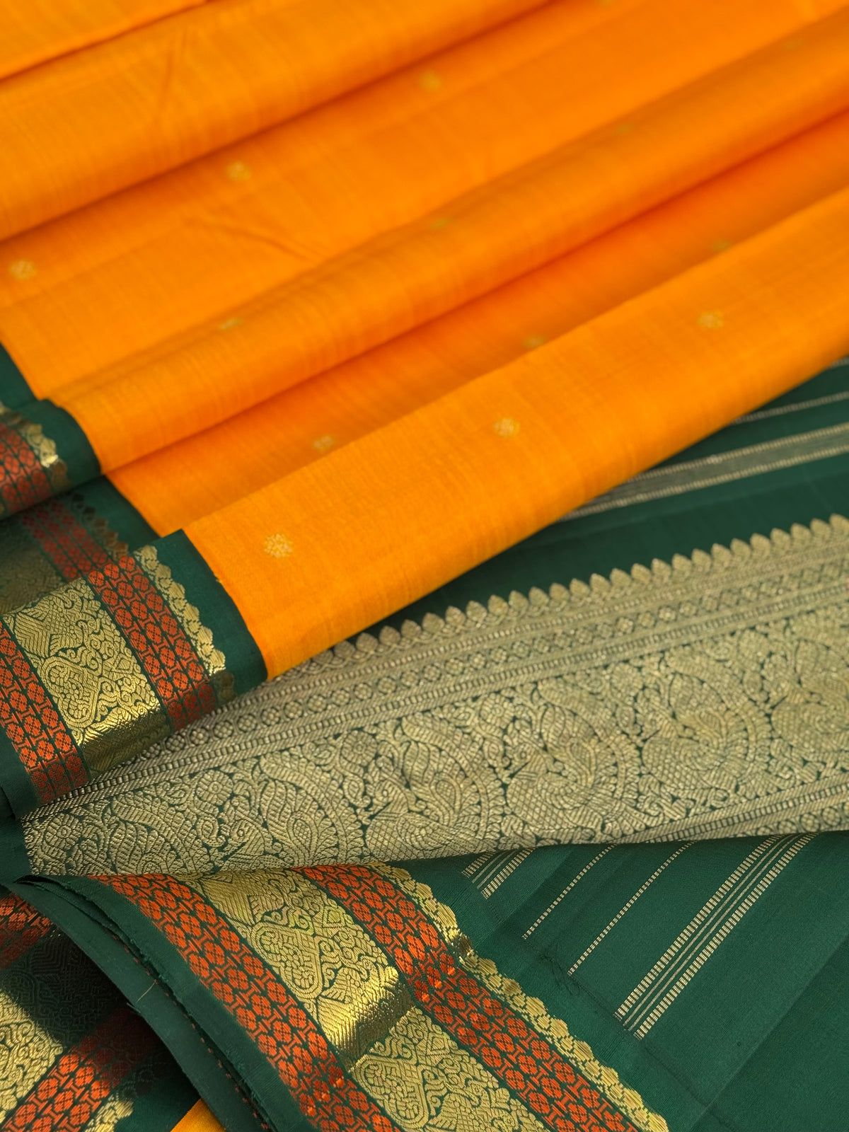 A Masterpiece kanchivaram korvai silk saree in mambazha yellow and bottle green
