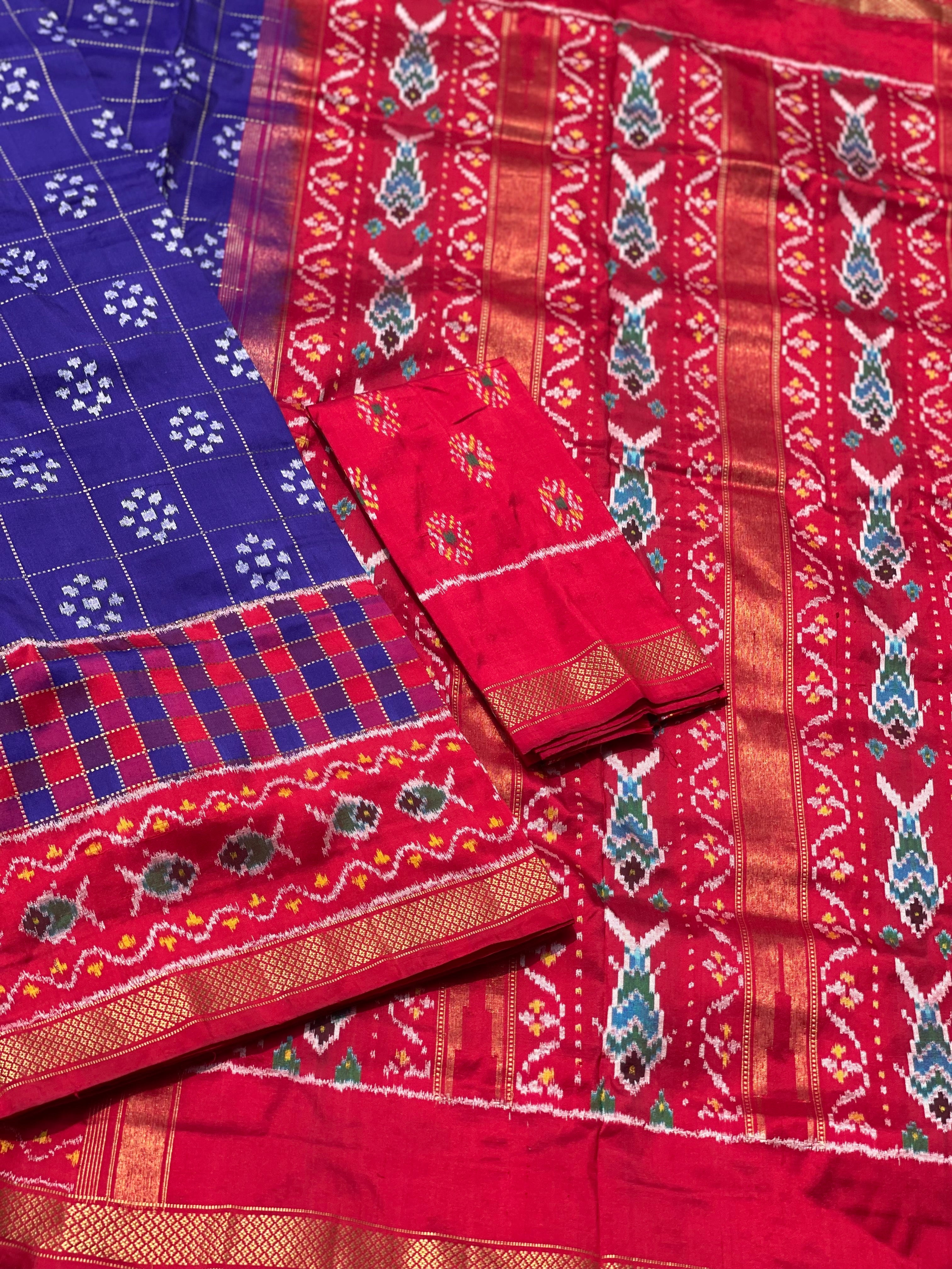 A purple blue and red silk ikkat saree with vintage kanchivaram Pettu border