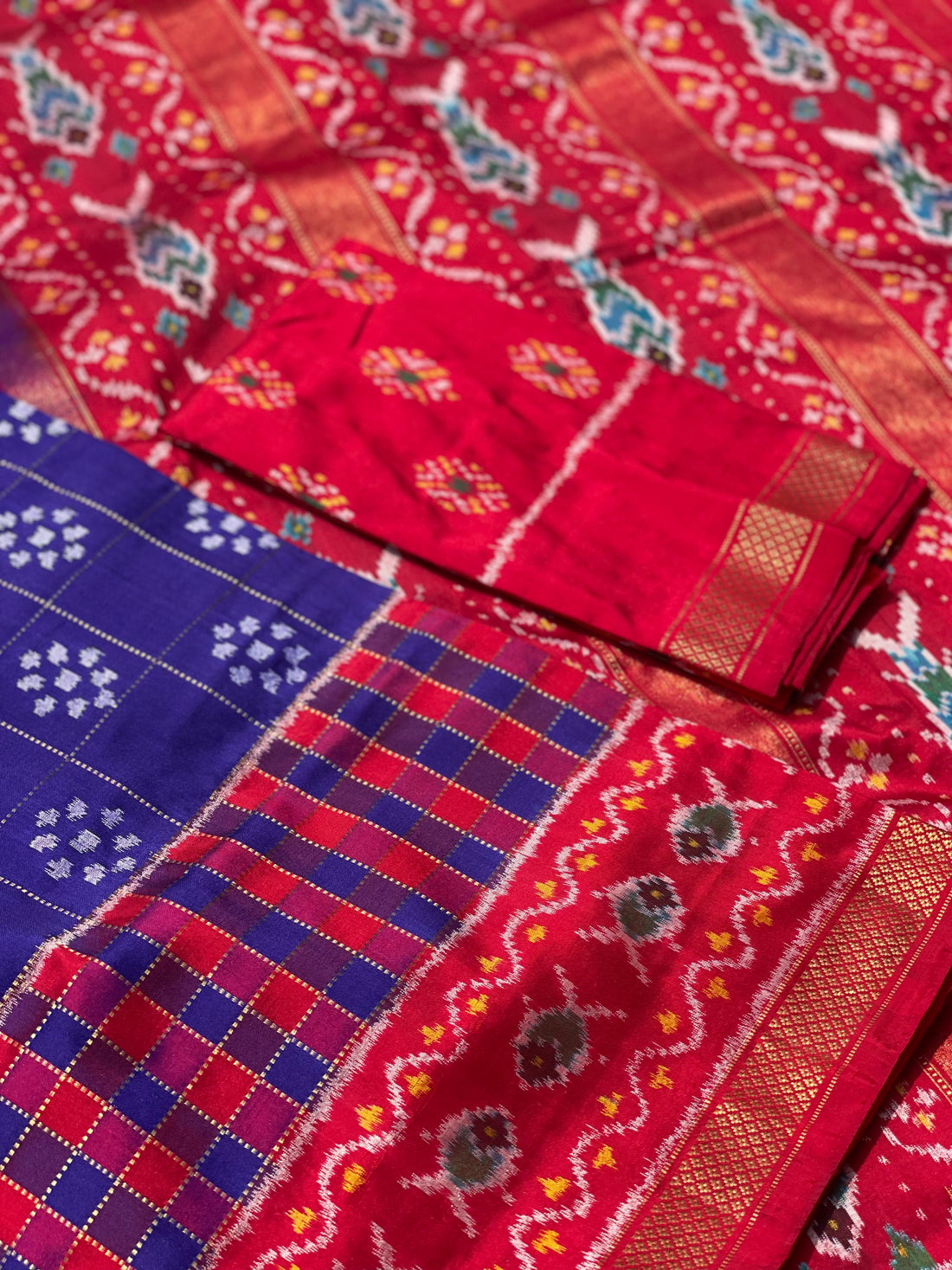 A purple blue and red silk ikkat saree with vintage kanchivaram Pettu border