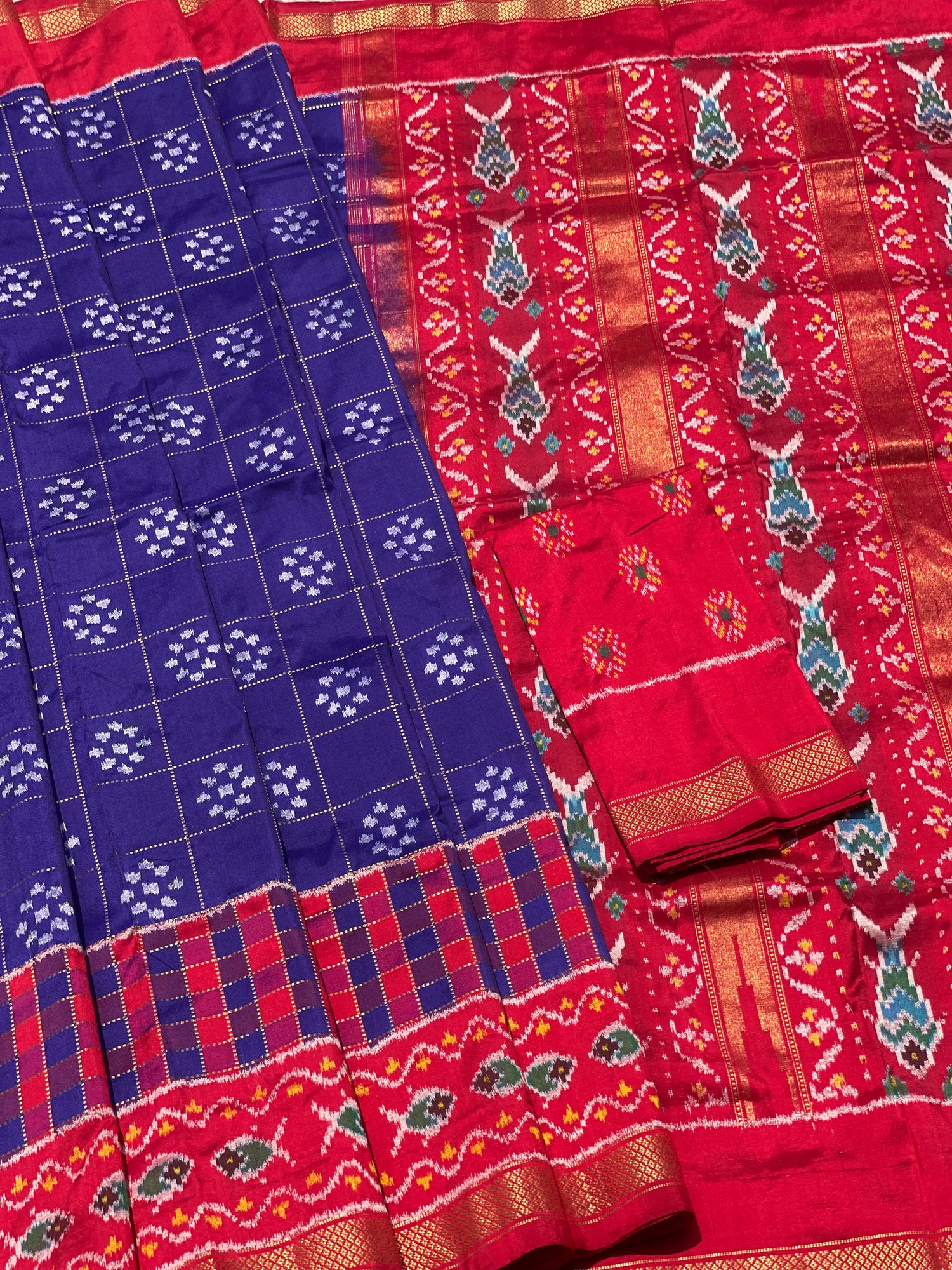 A purple blue and red silk ikkat saree with vintage kanchivaram Pettu border