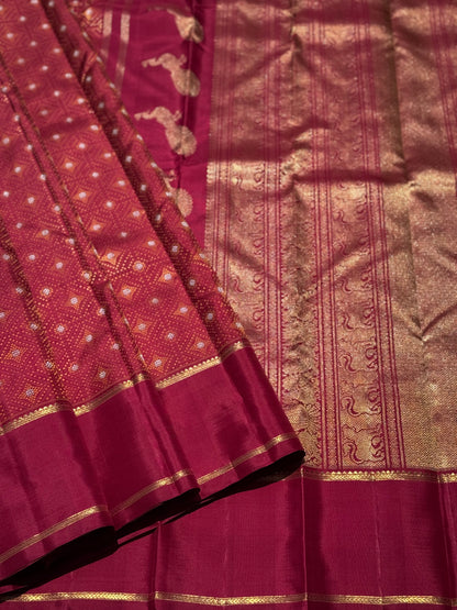 An epitome masterpiece arakku shade bhandini inspired kanchivaram silk saree masterpiece