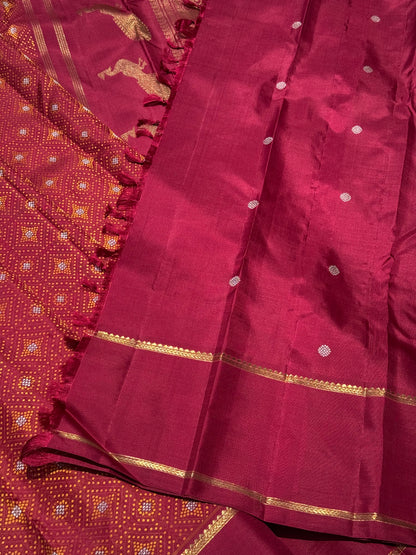 An epitome masterpiece arakku shade bhandini inspired kanchivaram silk saree masterpiece