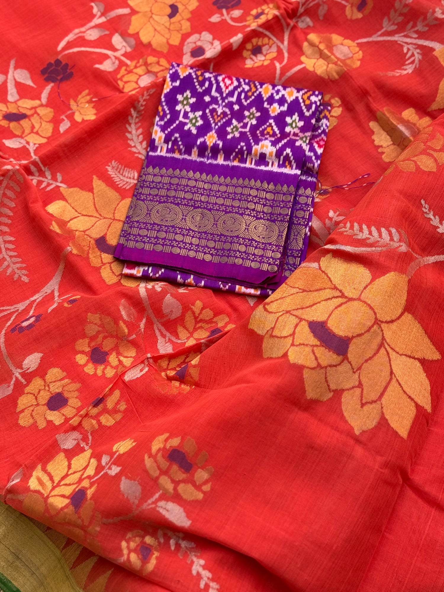 A gorgeous handspun ponduru Khadhi jamdani cotton saree in burnt orange