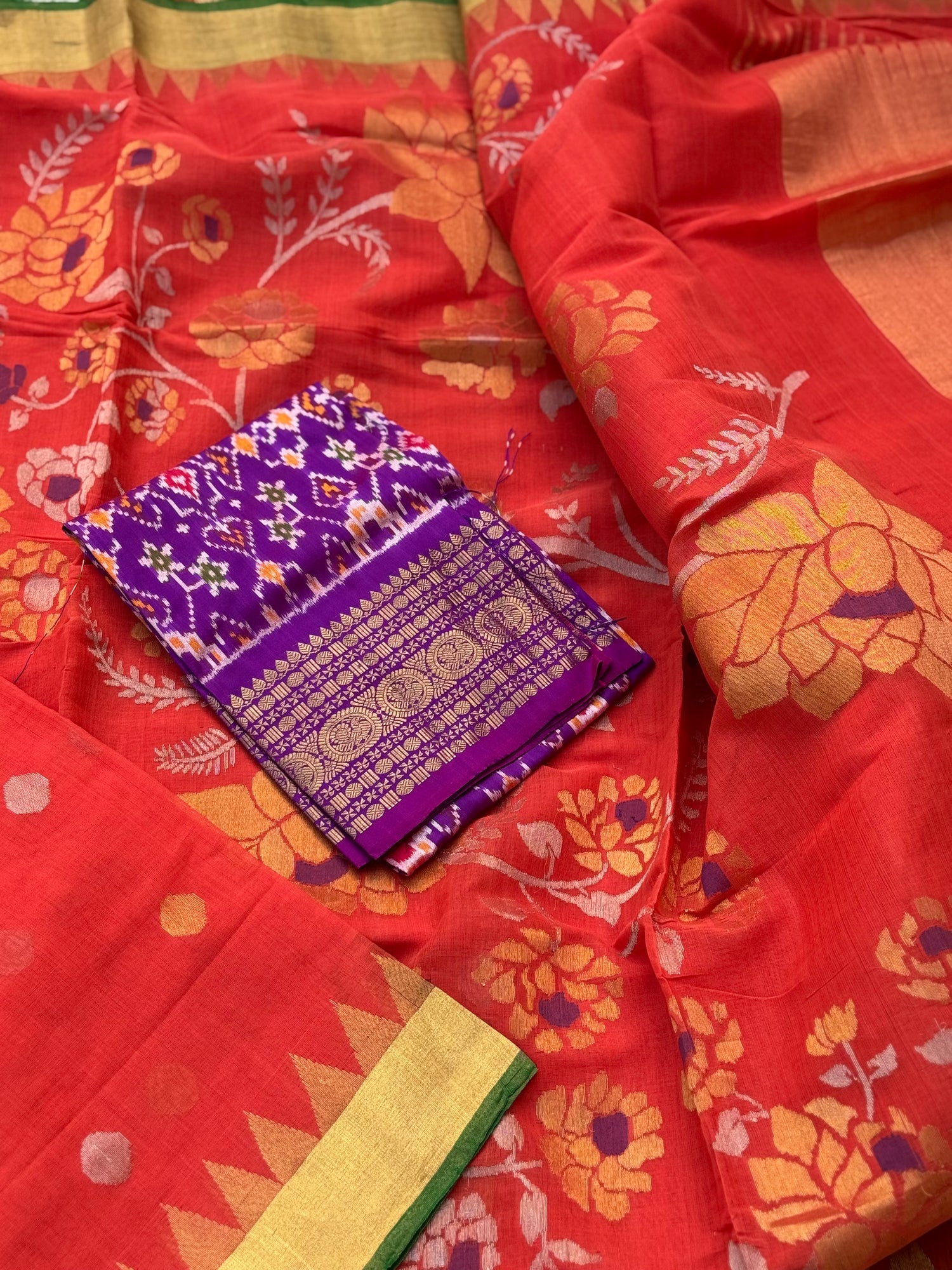 A gorgeous handspun ponduru Khadhi jamdani cotton saree in burnt orange